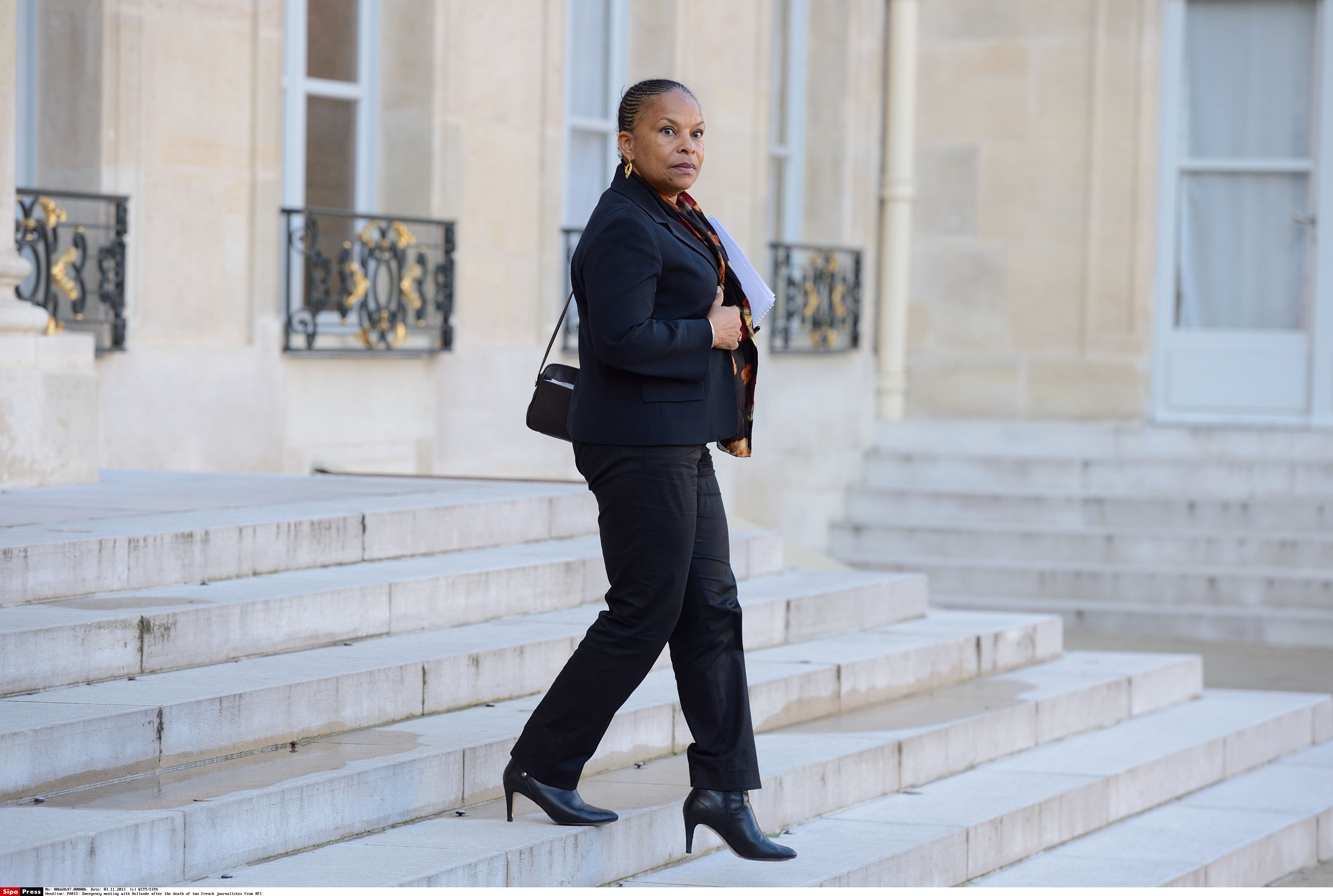 Justice Minister Christiane Taubira leaves the Elysee Palace after an emergency meeting with French President Francois Hollande., Associated Press/CTR