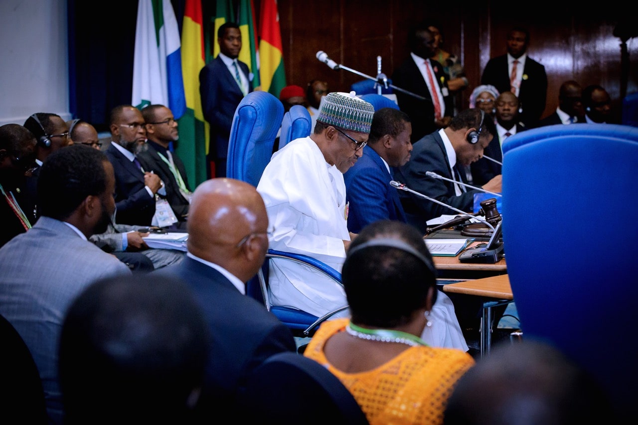 This handout picture released by the Nigerian Office of the President shows President Muhammadu Buhari (C-L) giving a press conferecne with Republic of Togo President Faure Essozimna Gnassingbe Eyadema (C-R) during the 52nd ECOWAS Heads of State Summit held in Abuja, 16 December 2017 , SUNDAY AGHAEZE/AFP/Getty Images
