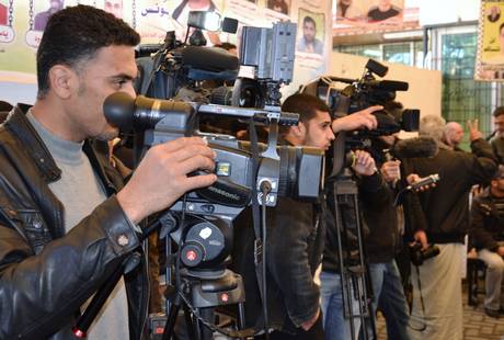 Journalists film a demonstration in Gaza city on 17 February 2013, Kjetil Haanes/IPI