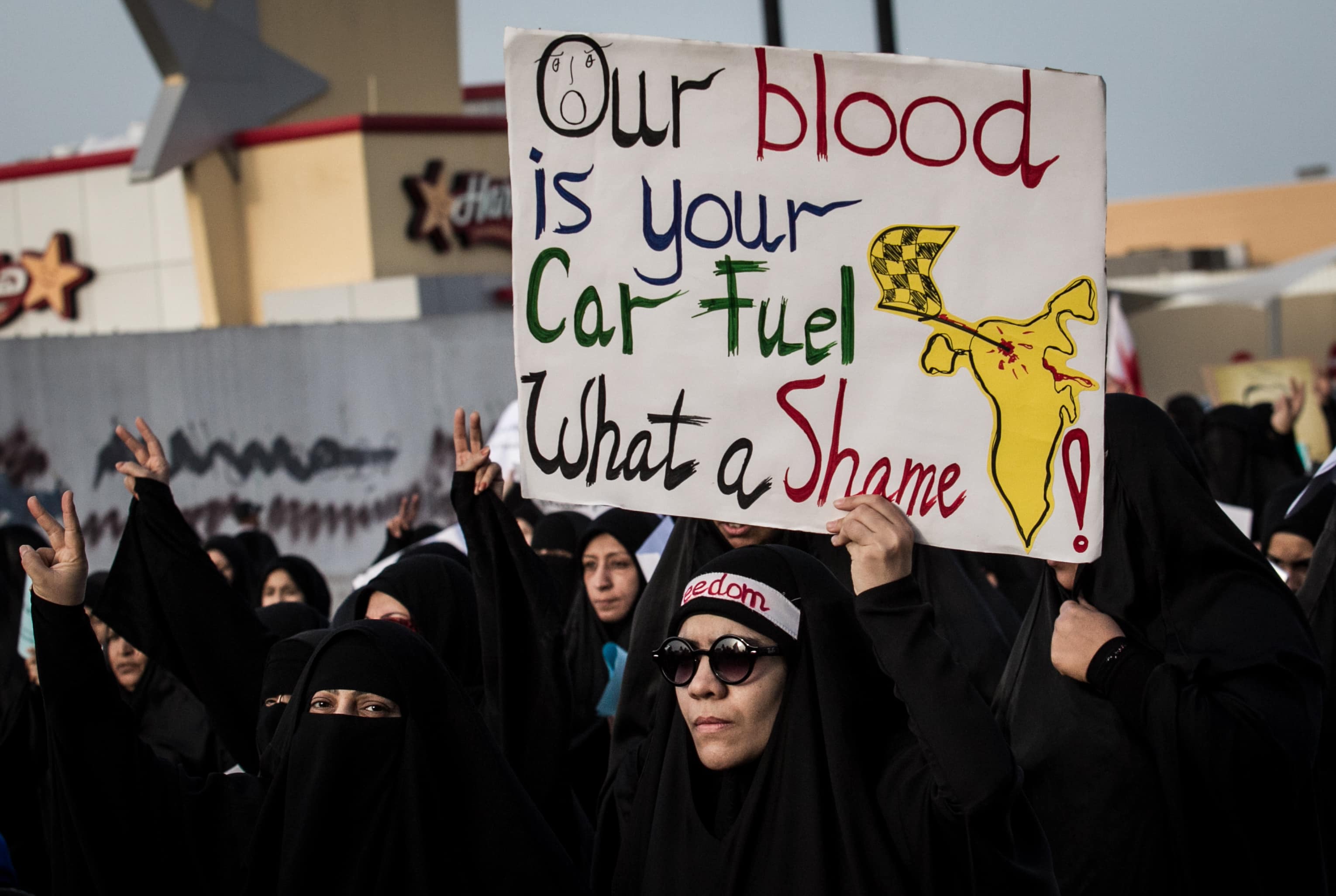 Opposition rally demanding to overthrow dictatorship. Protesters raised political prisoners pictures and posters refusing to F1 race., Photo by Ahmed AlFardan/NurPhoto/Corbis via Getty Images