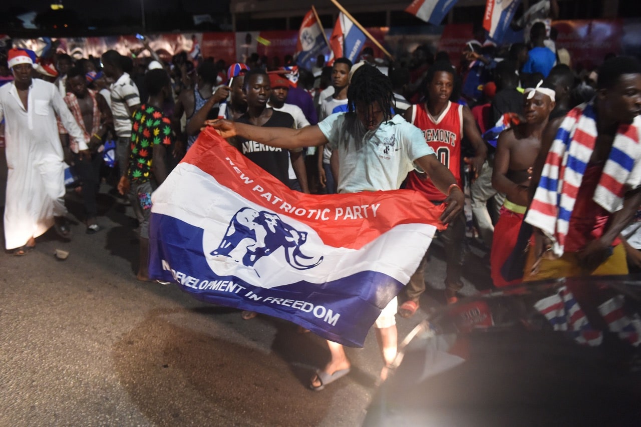 Supporters celebrate as presidential candidate Nana Akufo-Addo, of the opposition New Patriotic Party, is declared elected by the Electoral Commission in Accra, Ghana, 9 December 2016, PIUS UTOMI EKPEI/AFP/Getty Images)