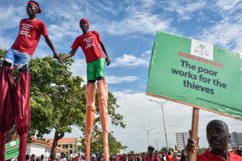 A demonstration dubbed 'Fabewoso - Bring it on' raises awareness about the high rate of corruption in the country, in Accra, Ghana, 26 May 2017, CRISTINA ALDEHUELA/AFP/Getty Images