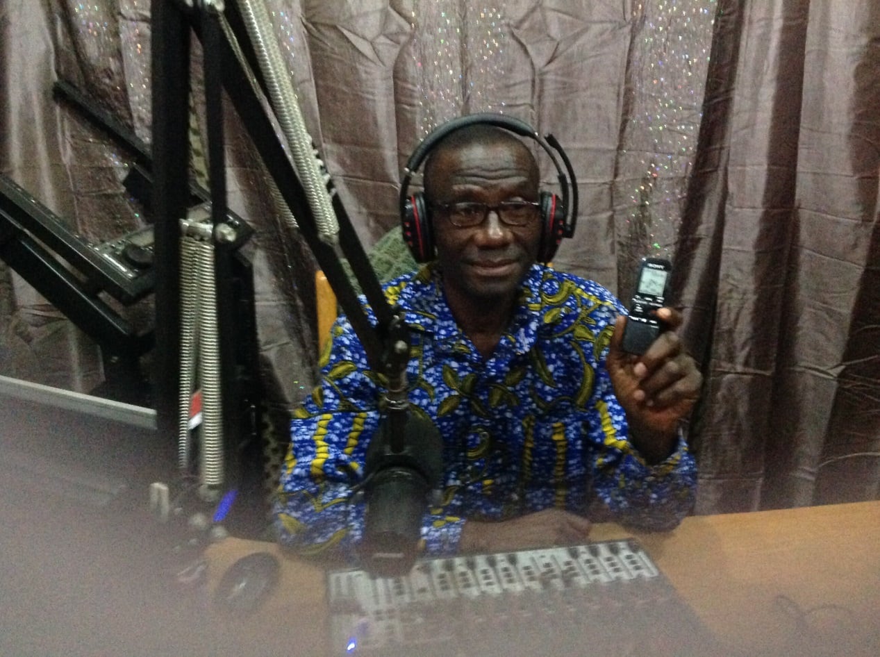 Rev. Winston Binabiba shows the digital recorder that Radio Gaakii received from the MFWA, Media Foundation for West Africa