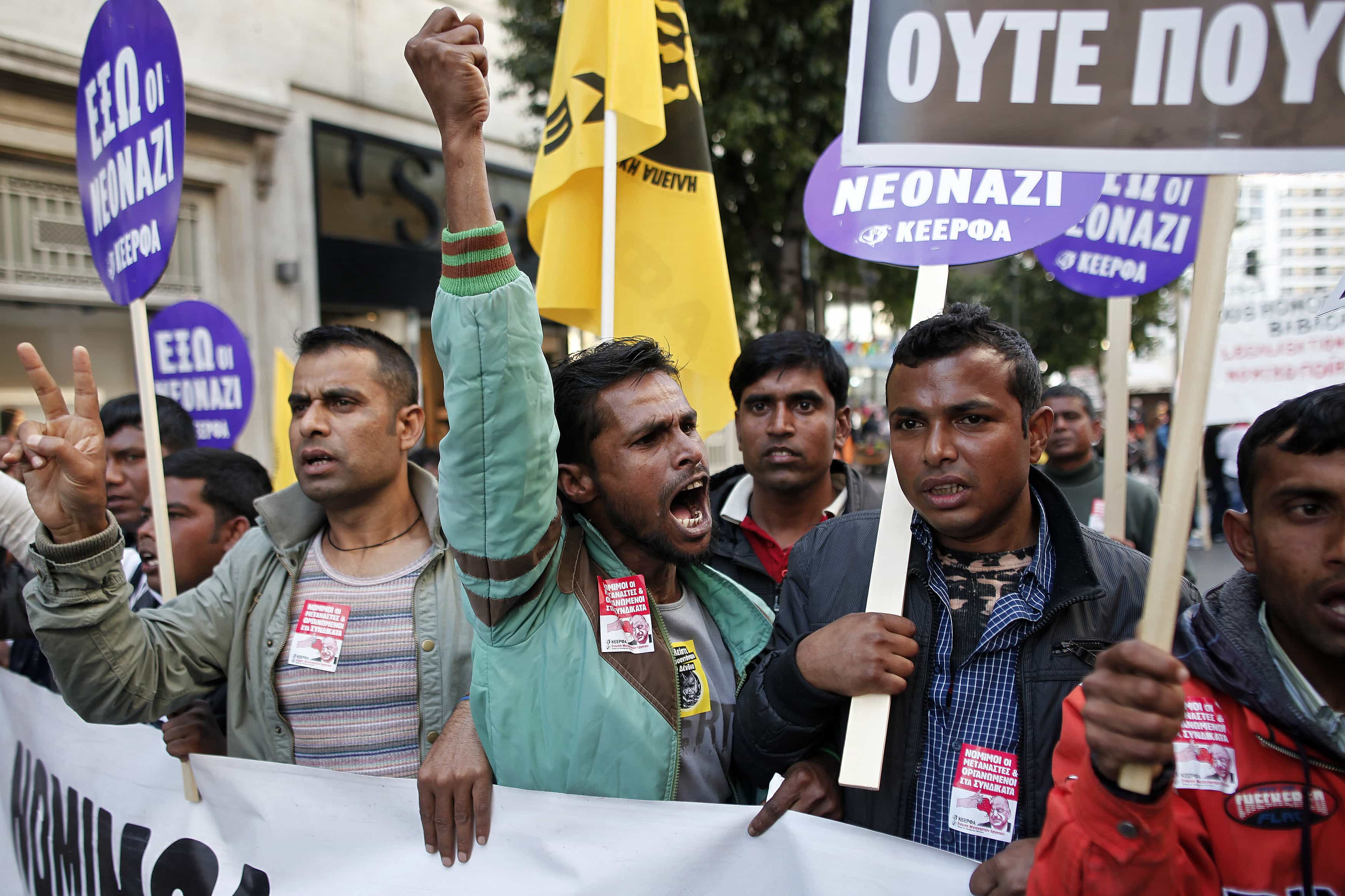 Immigrants shout slogans during an anti-racism rally in Athens, 22 March 2014, REUTERS/Alkis Konstantinidis