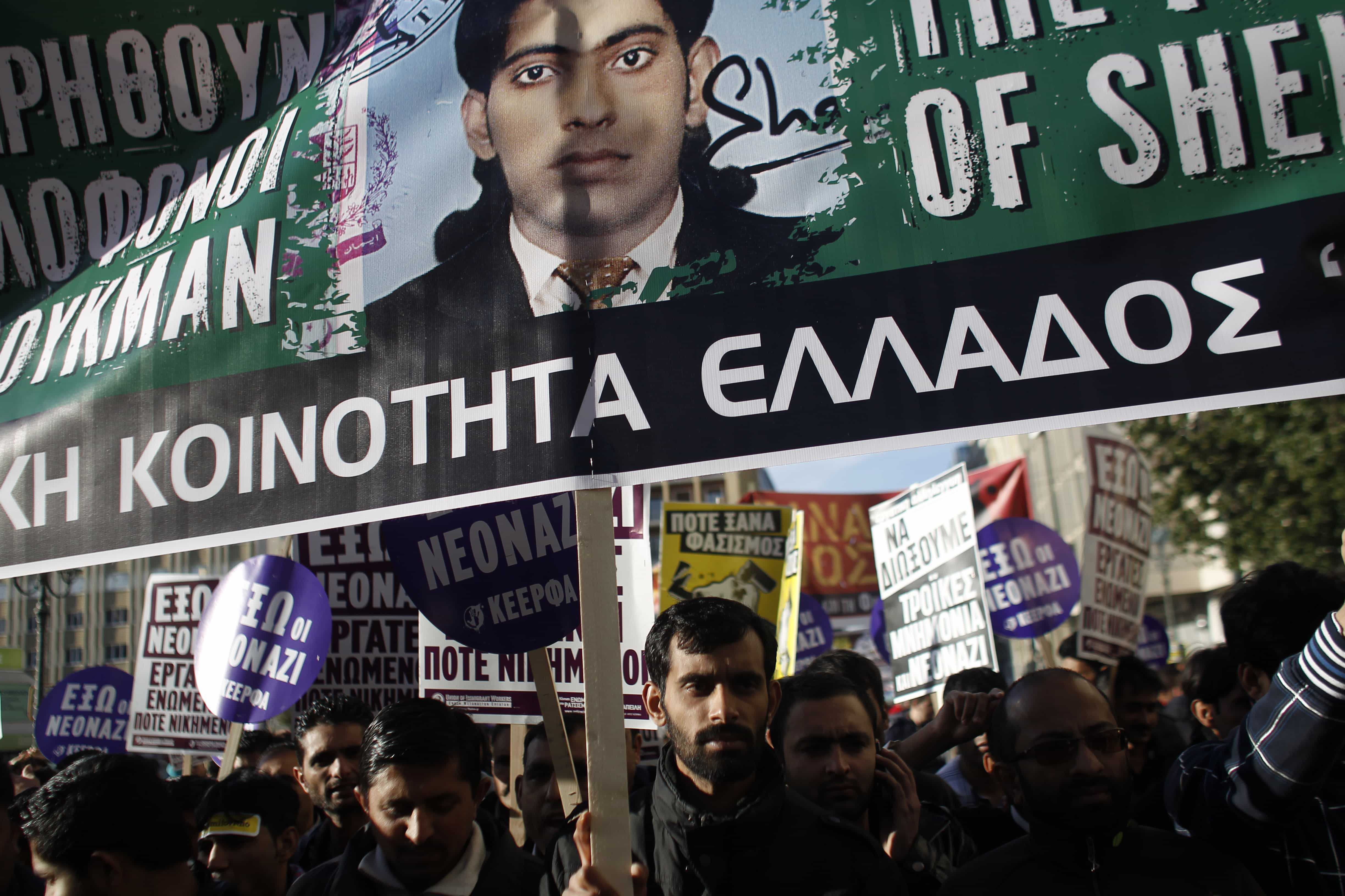 Mourners protest against the murder of Shehzad Luqman, a Pakistani immigrant who was killed by suspected extreme rightists, in Athens, 19 January 2013., AP Photo/Kostas Tsironis