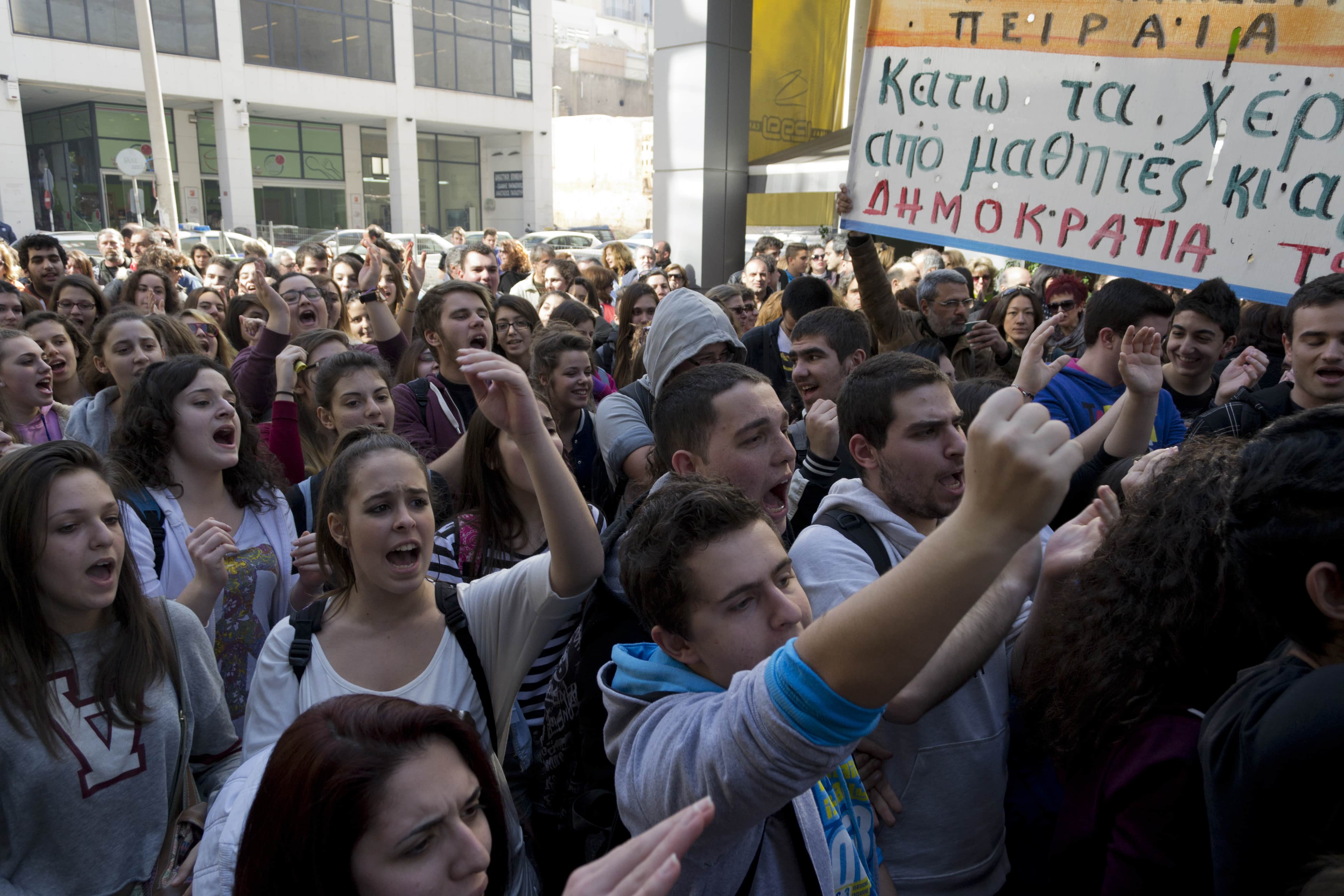 Students gather outside the court in Piraeus to protest police calling them to ask sensitive questions about their political beliefs and financial status., Nikolas Georgiou/Demotix