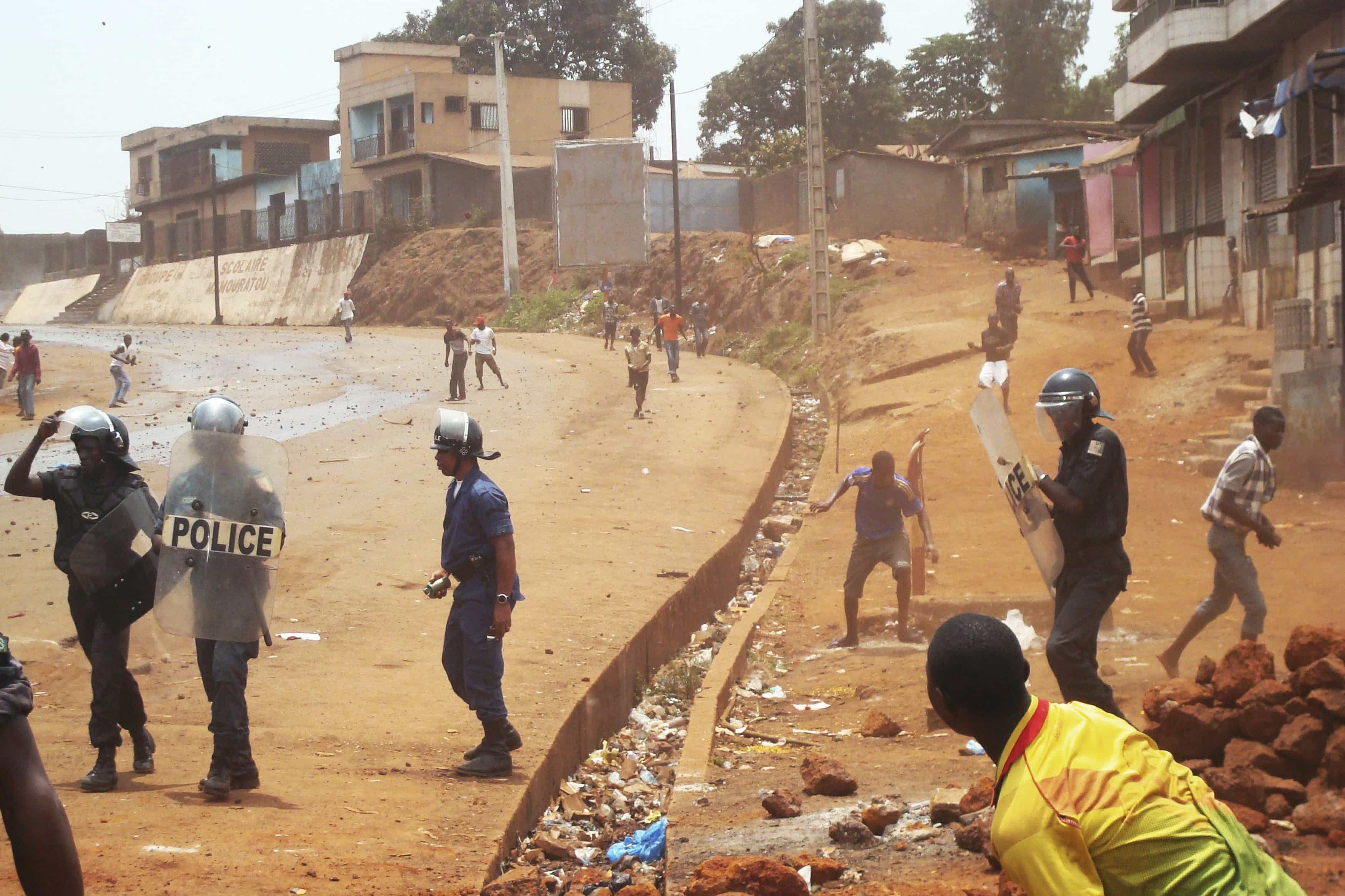 Police battle opposition protesters during a political rally in Conakry, 2 May 2 2013. , Reuters