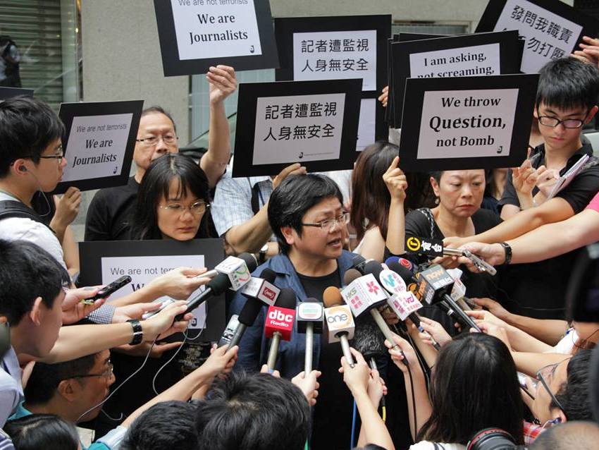Journalists protest the harassment of Hong Kong journalists during the APEC summit in Indonesia, outside the Indonesian consulate in Hong Kong., Hong Kong Journalists Association