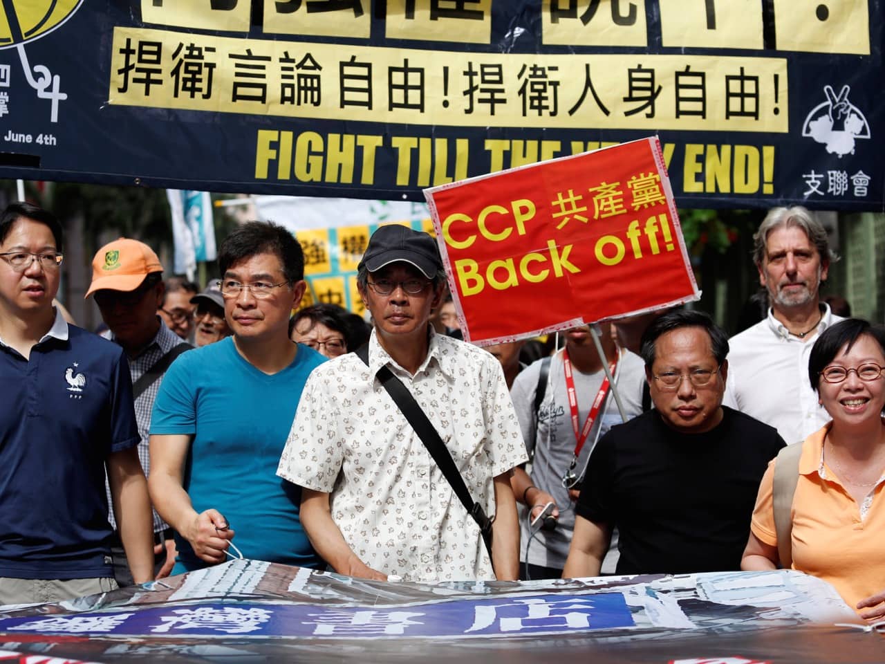 Bookseller Lam Wing-kee (C), who "disappeared" in late 2015, takes part in a protest march with pro-democracy lawmakers and supporters in Hong Kong, China, 18 June 2016 , REUTERS/Bobby Yip