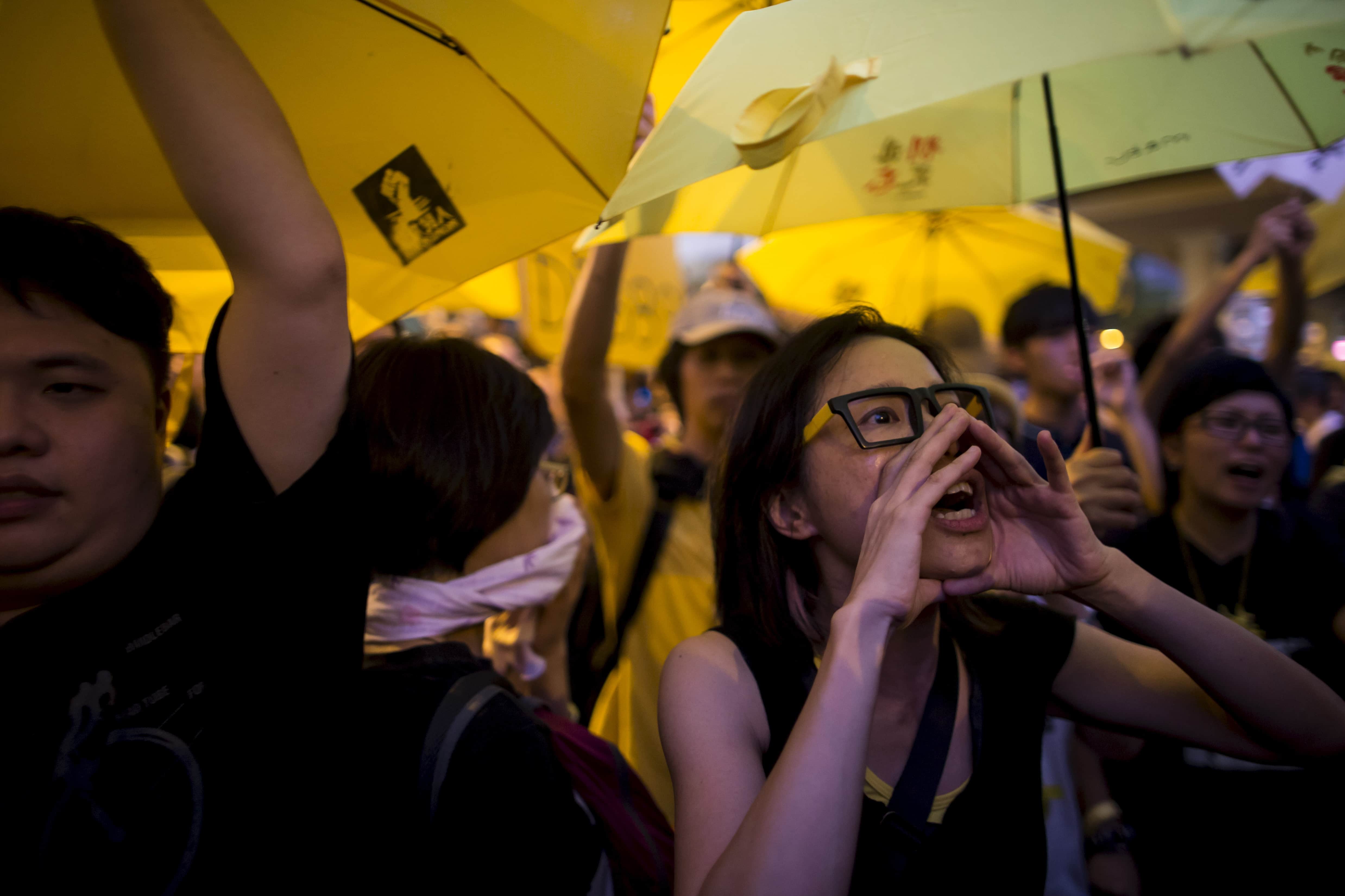 A pro-democracy protester shouts during a rally outside government headquarters in Hong Kong, 28 September 2015, REUTERS/Tyrone Siu