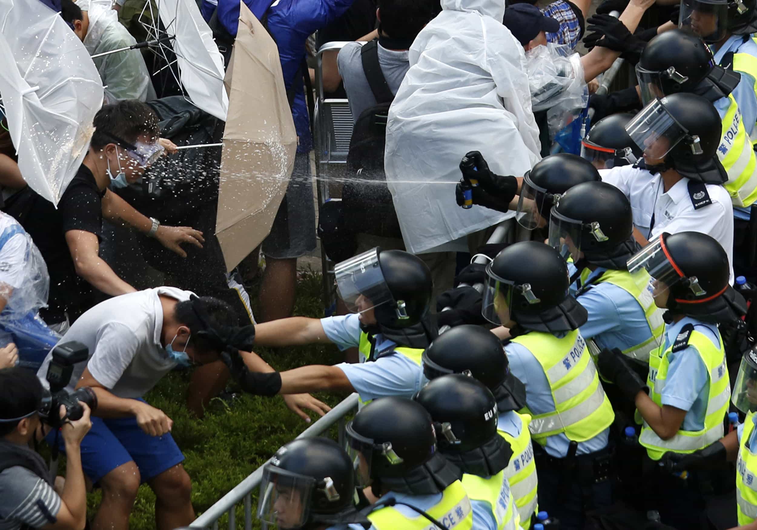 Riot police use pepper spray as they clash with protesters in Hong Kong, 28 September 2014, REUTERS/Bobby Yip