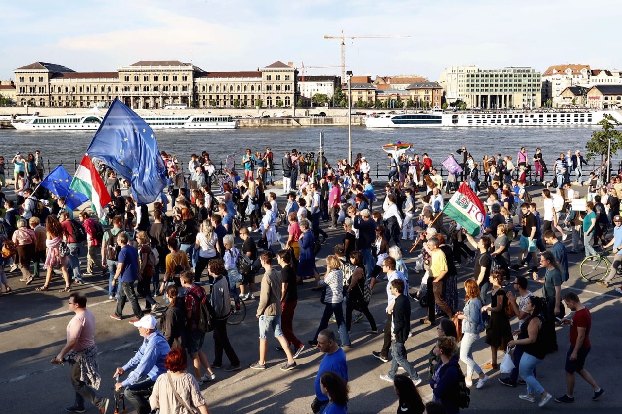 Protesters march in Budapest, Hungary, on 21 May 2017, in a demonstration against tough laws targeting foreign-backed NGOs and higher education institutions, STR/AFP/Getty Images