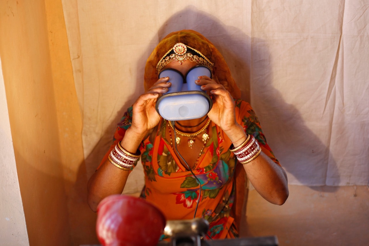 A villager goes through the process of eye scanning for the Unique Identification (UID) database system at an enrolment centre in Merta district, Rajasthan, 21 February 2013, REUTERS/Mansi Thapliyal