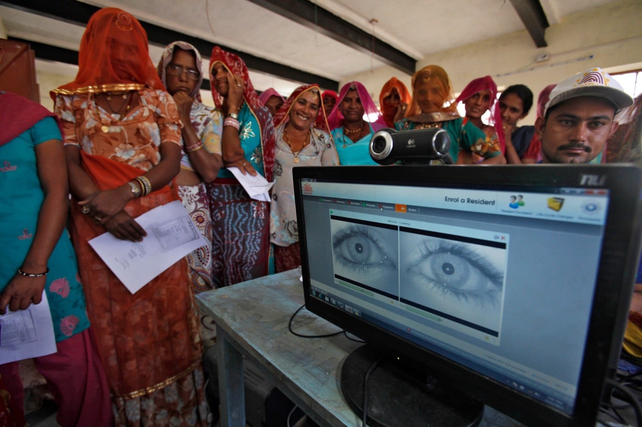 Village women stand in a queue to get enrolled for the Unique Identification (UID) database system in the desert Indian state of Rajasthan, 22 February 2013, REUTERS/Mansi Thapliyal