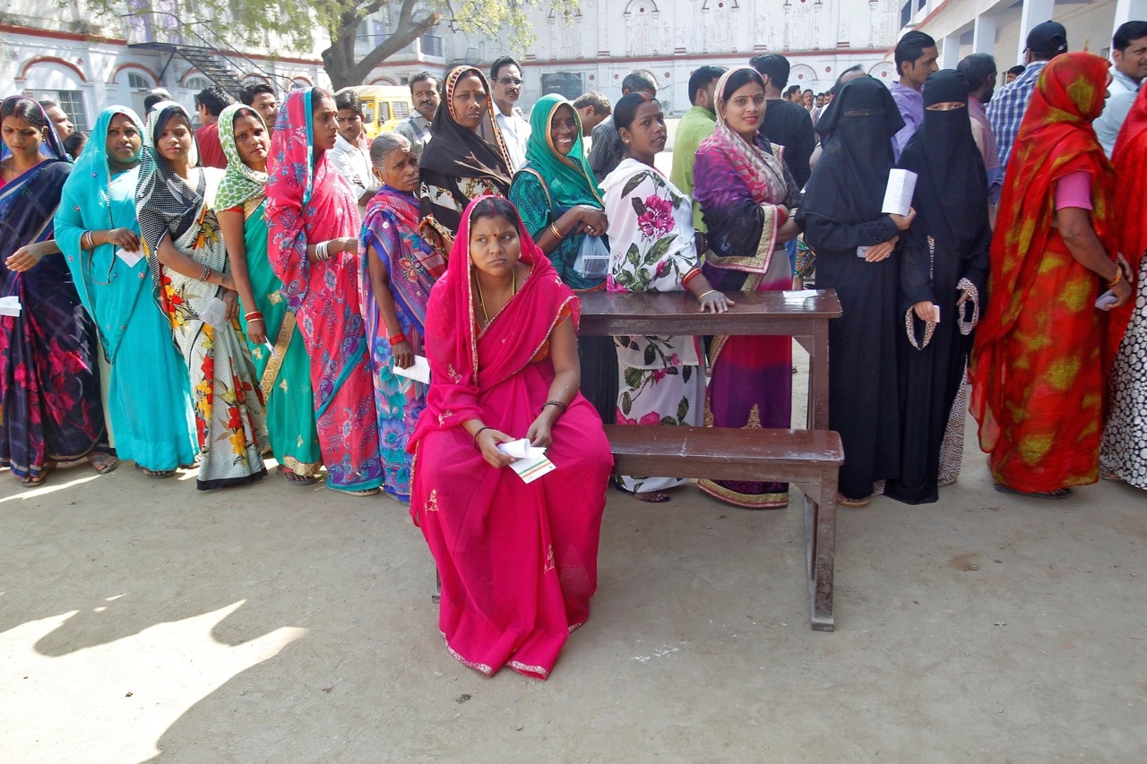 People queue up to vote at a polling booth during the last phase of the Uttar Pradesh state assembly election, in Varanasi, India, 8 March 2017, REUTERS/Jitendra Prakash