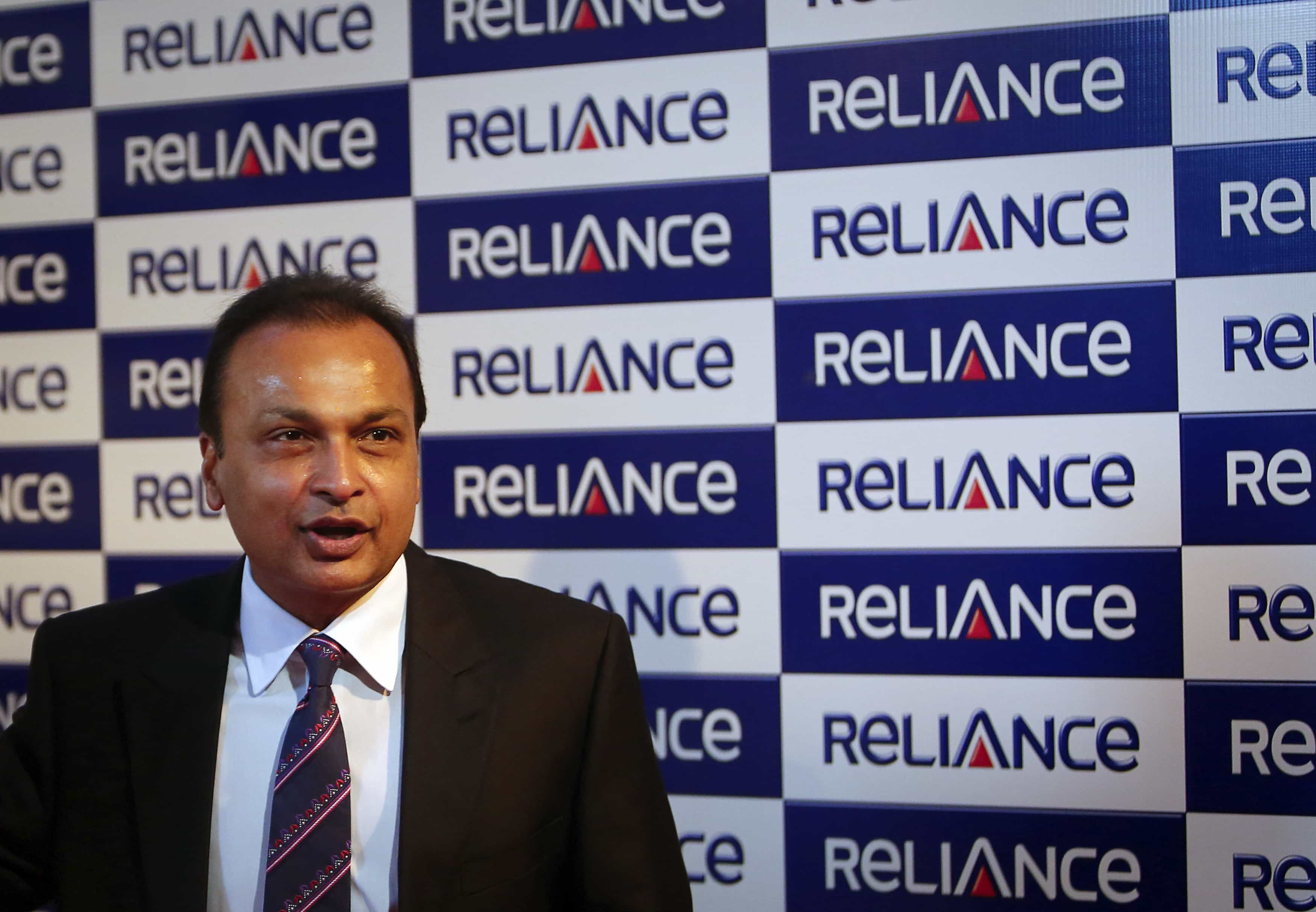 Anil Ambani, chairman of the Reliance Anil Dhirubhai Ambani Group, poses for photographers before addressing the annual shareholders meeting in Mumbai, 27 August 2013, REUTERS/Danish Siddiqui