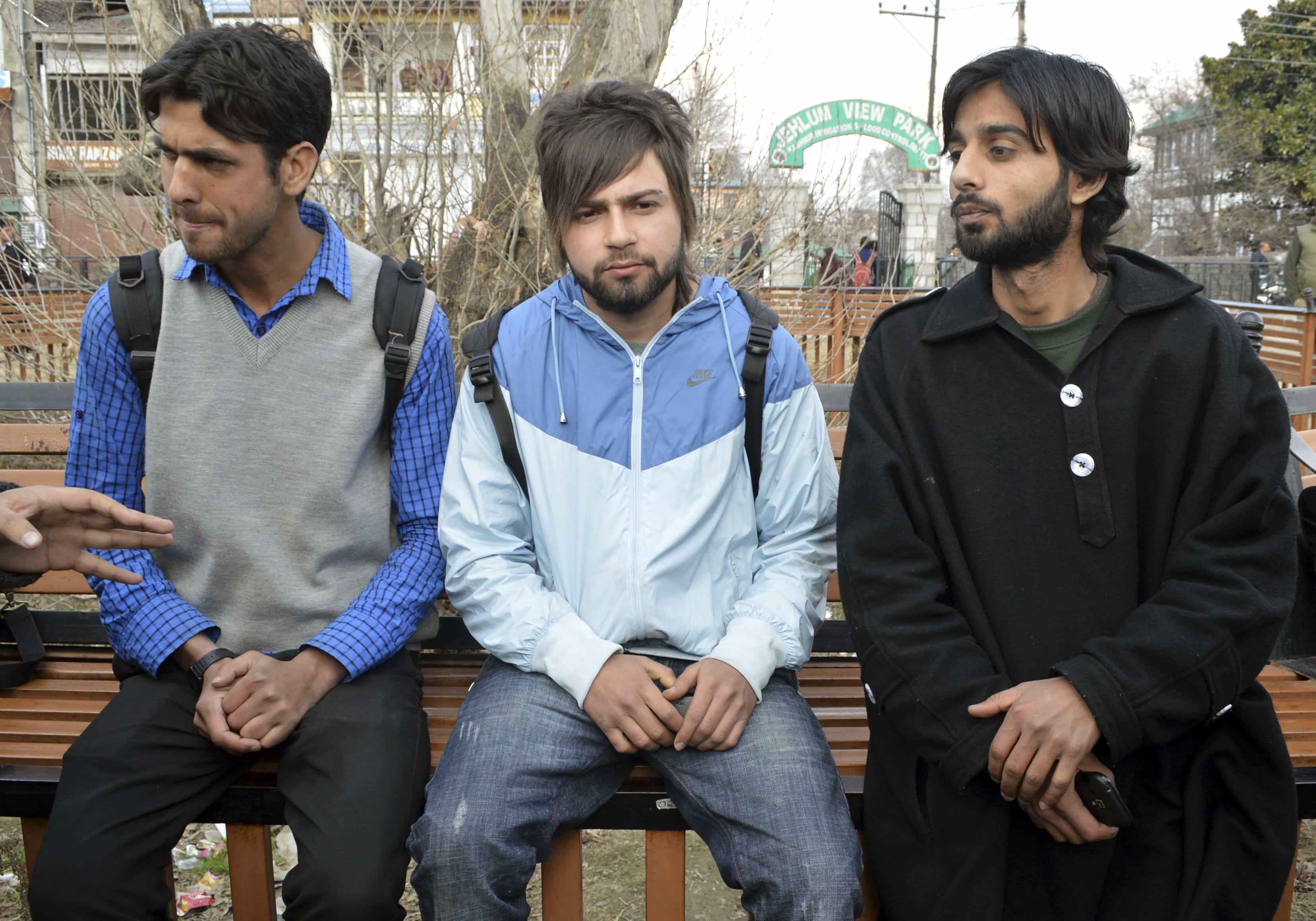 Kashmiri students, who were suspended by a private university for cheering for Pakistan during a cricket match against India, speak with the media in Srinagar, 6 March 2014, REUTERS/Stringer
