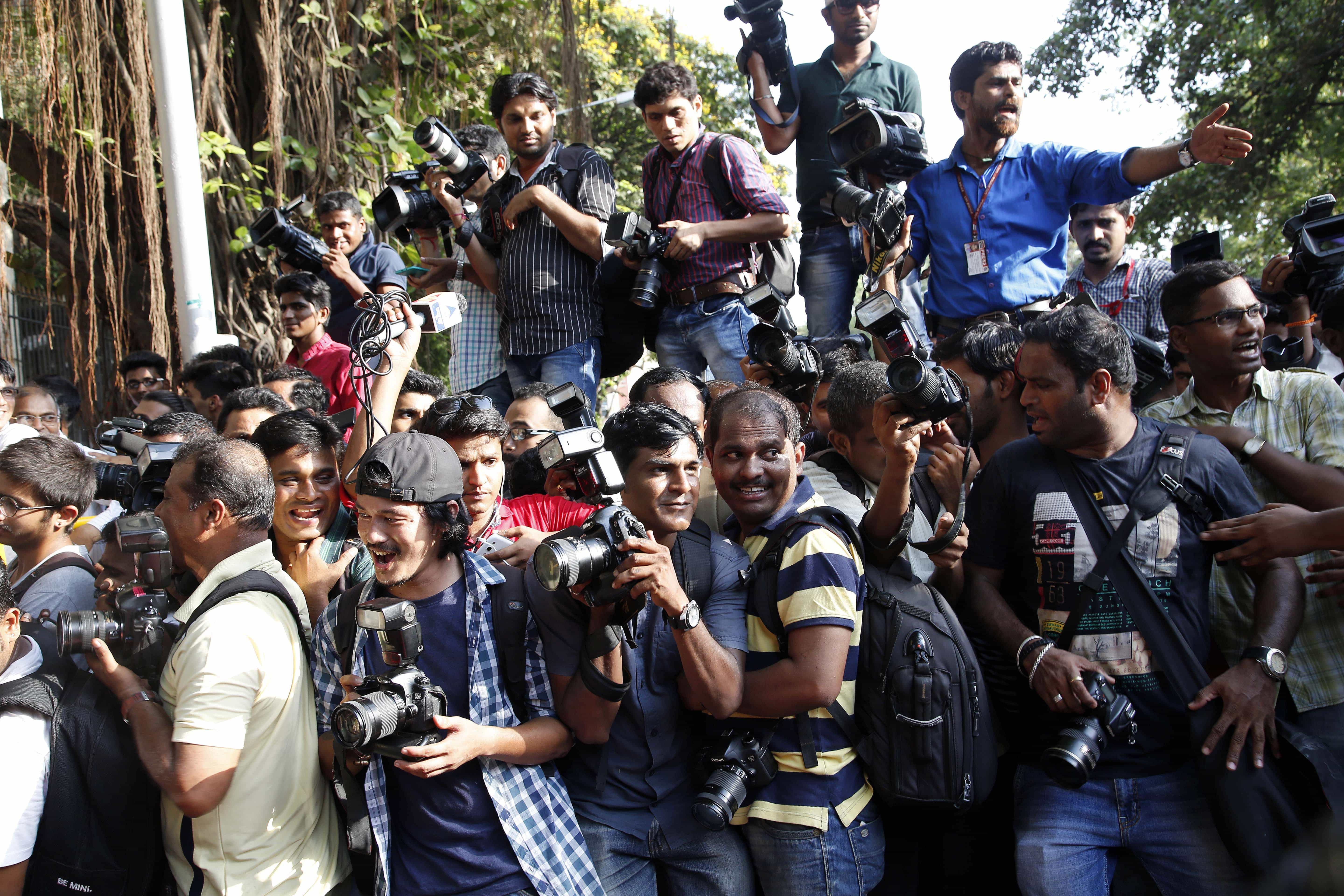 Members of the media jostle for space outside the Mumbai Sessions court during a Bollywood actor's trial, 6 May 2015, AP Photo/Rajanish Kakade
