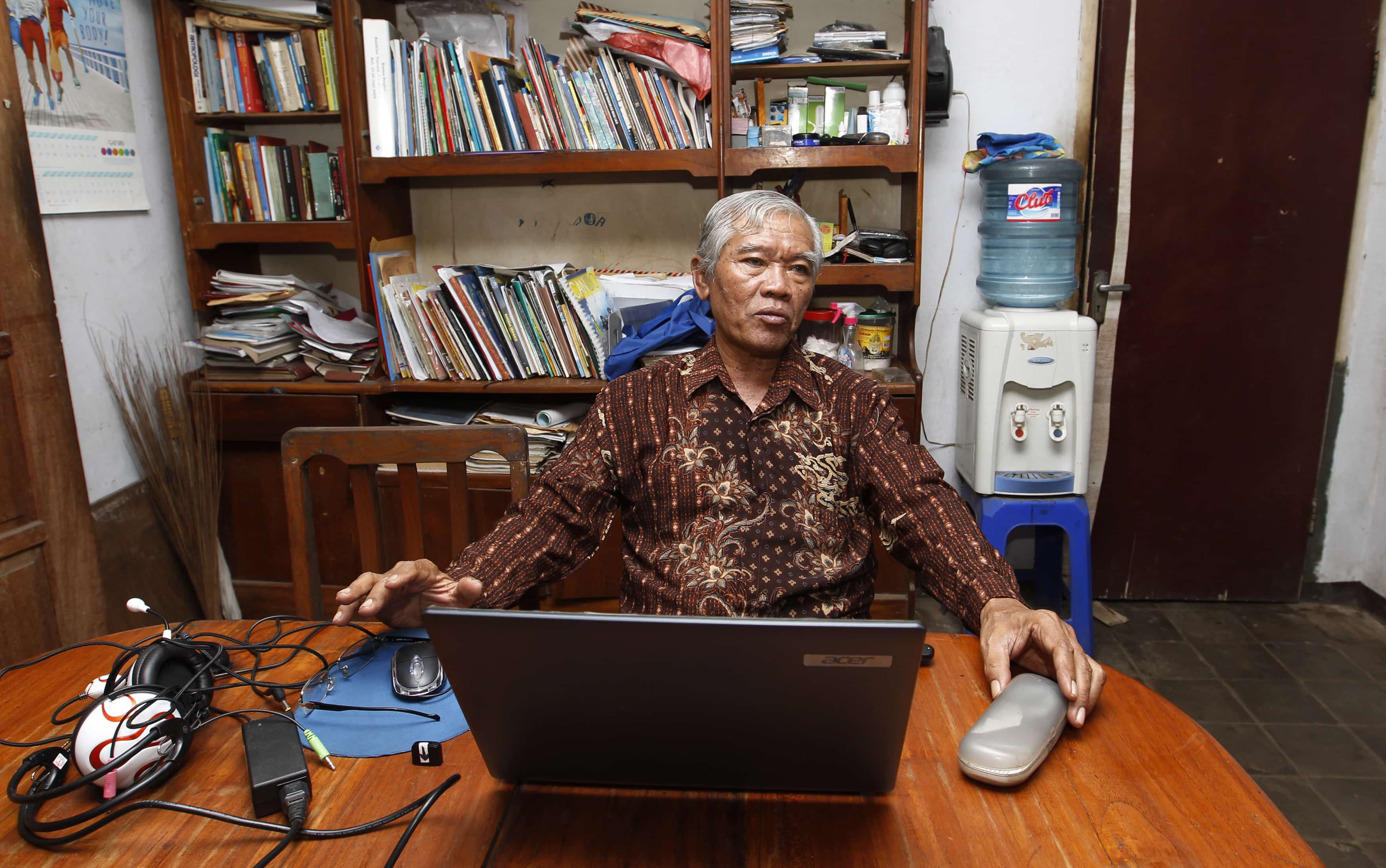 Bejo Untung in his house on the outskirts of Jakarta, 12 February 2013. He was a schoolboy when armed soldiers came to his village in 1965, forcing him on the run for years until he was caught, tortured and jailed, REUTERS/Enny Nuraheni