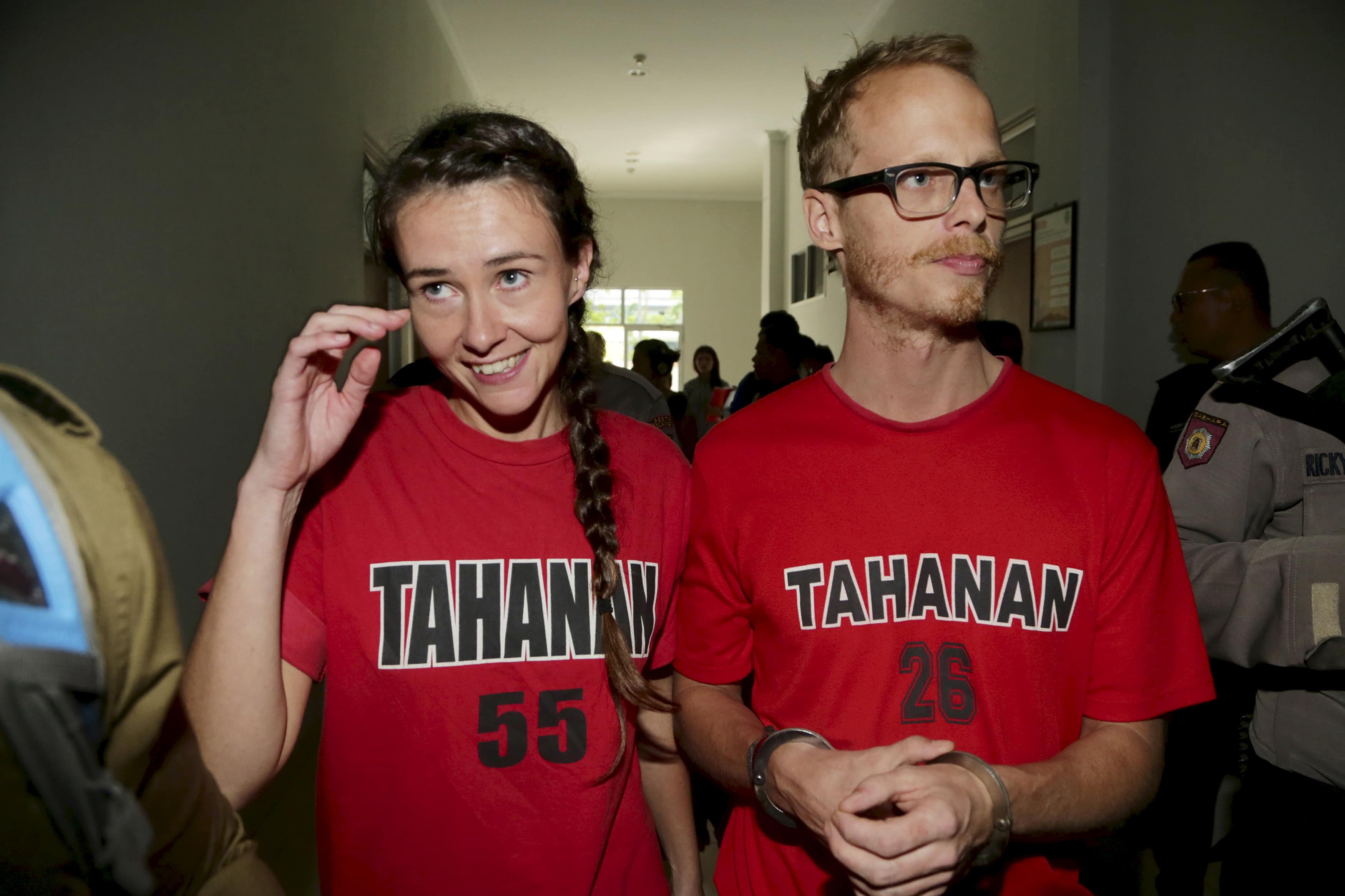 British journalists Neil Bonner (R) and Rebecca Prosser are seen after attending their court hearing at Batam District Court, Indonesia Riau Islands 3 November 2015 in this photo taken by Antara Foto, REUTERS/M N Kanwa/Antara Foto