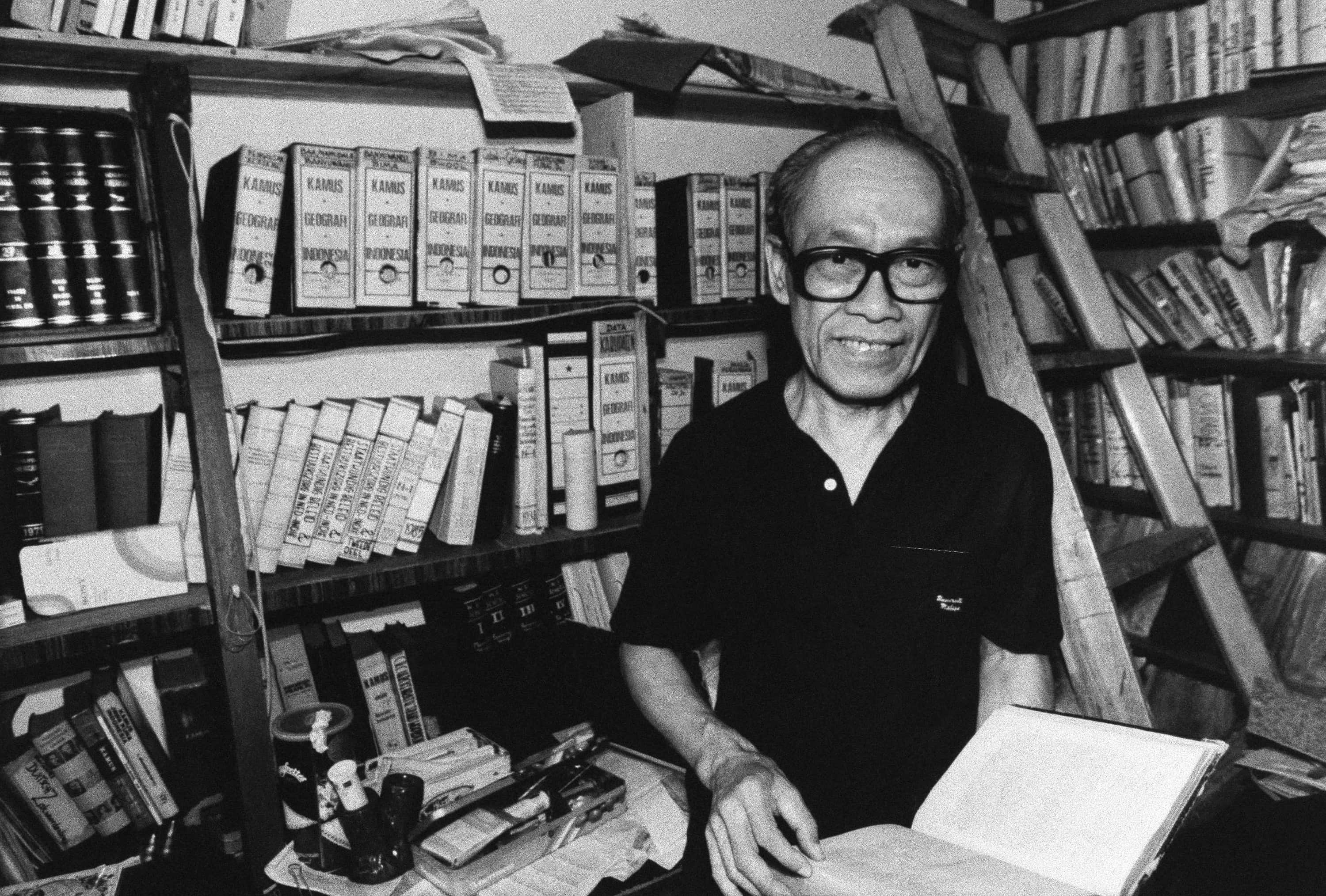 Indonesian writer Pramoedya Ananta Toer in his Jakarta home, August 1986; his most famous work The Buru Quartet was composed during his years of imprisonment on Buru Island, AP Photo/Charlie Hanley