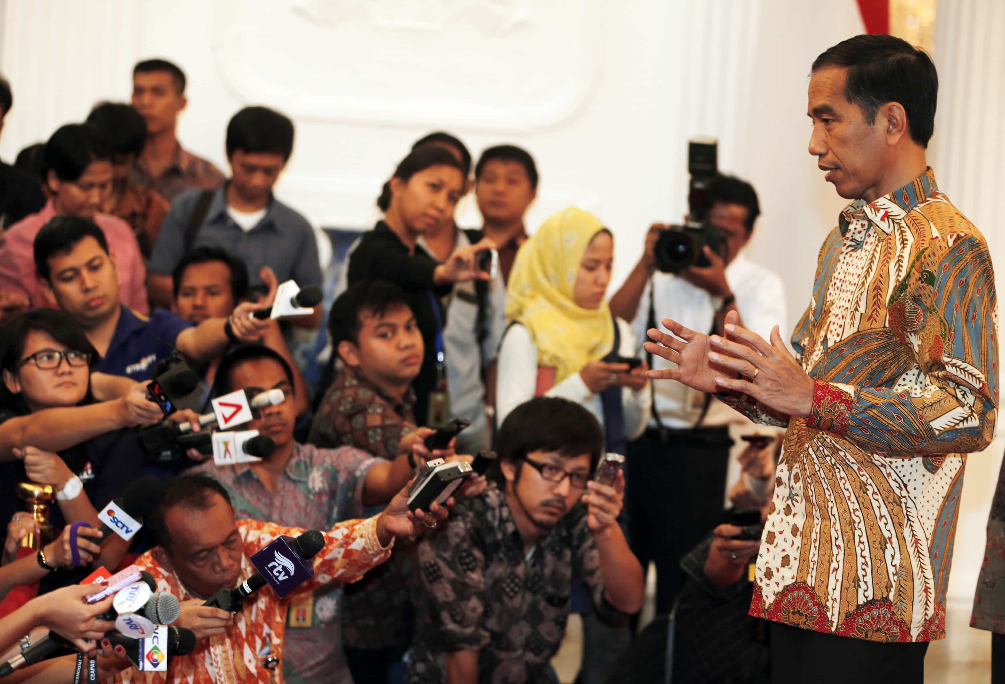 Indonesia's President Joko Widodo talks to reporters at the presidential palace in Jakarta, 3 November 2014, REUTERS/Beawiharta