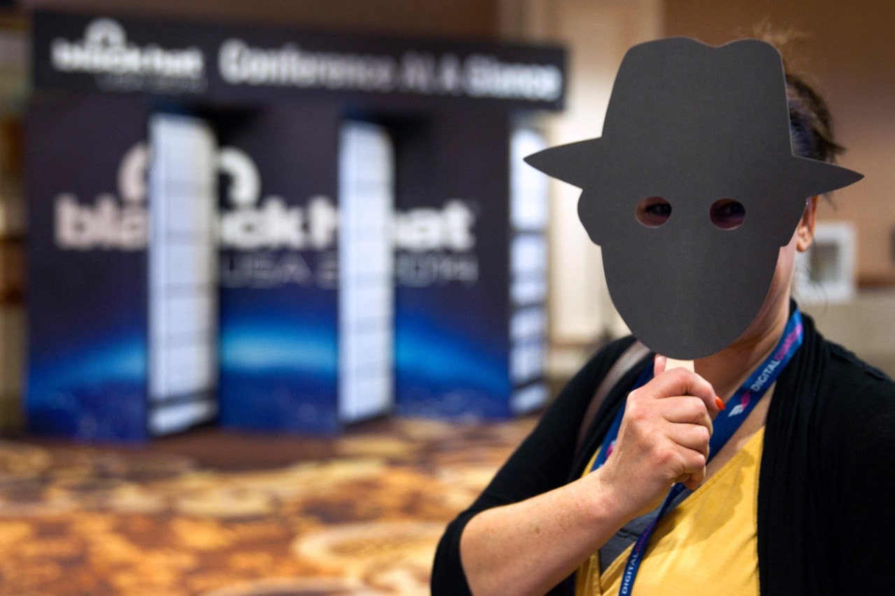 An individual attending a hacker conference holds an "anti-selfie" mask as part of a privacy awareness marketing campaign, in Las Vegas, Nevada, 5 August 2014, REUTERS/Steve Marcus