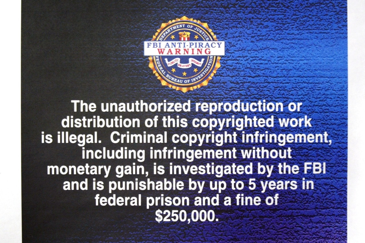 FBI anti-piracy warning text, to be displayed on digital and software intellectual property, is unveiled at a press conference in Los Angeles, California, 19 February 2004, David McNew/Getty Images