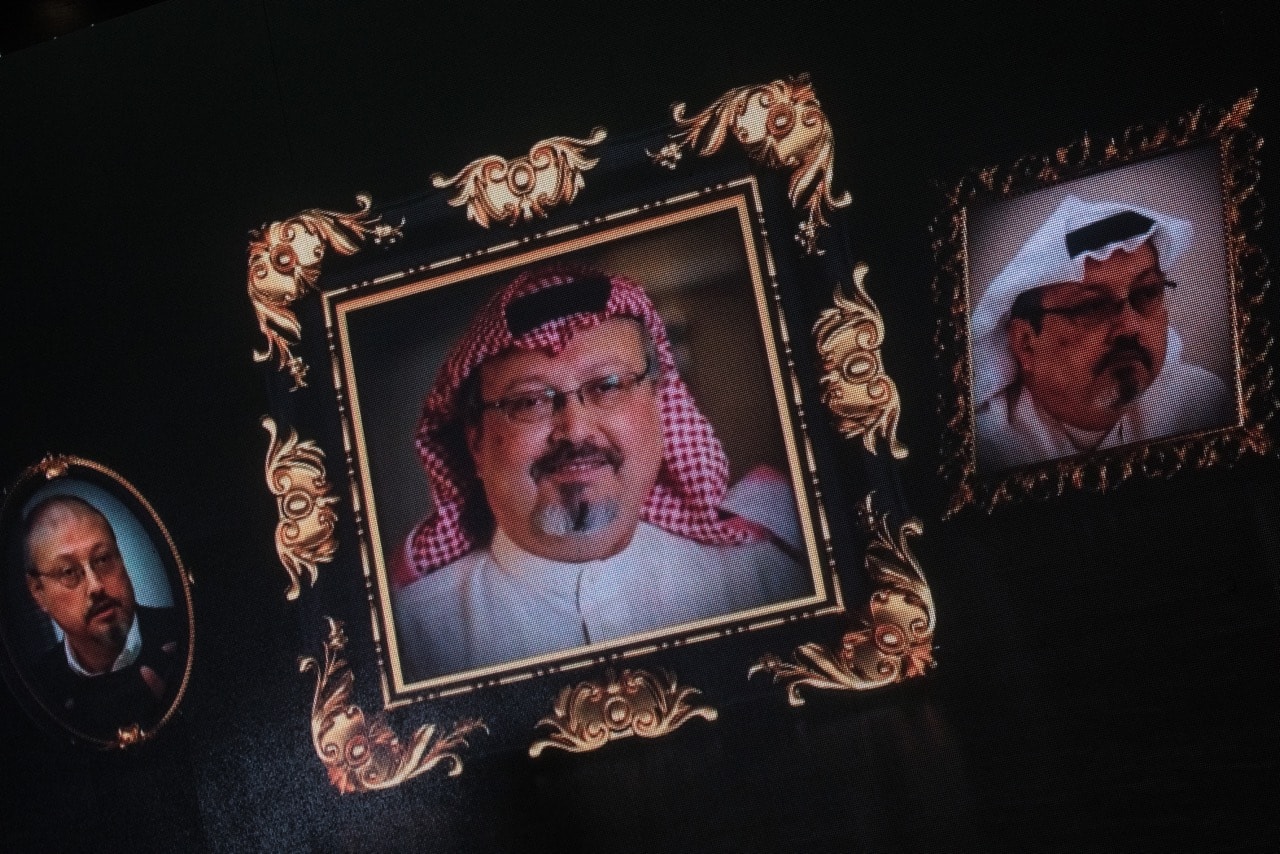 Images of murdered journalist Jamal Khashoggi are seen on a big screen during a commemorative ceremony held in Istanbul, Turkey, 11 November 2018, Chris McGrath/Getty Images