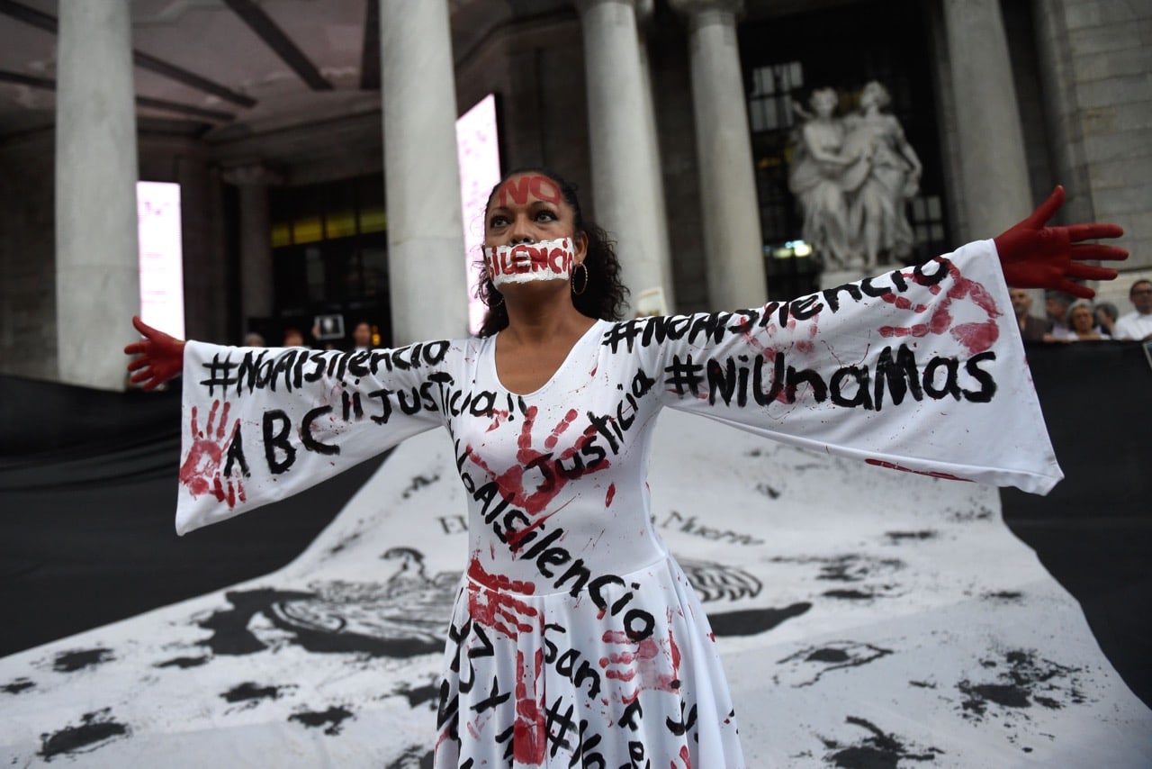 Mexican journalists take part in a protest to mark one month since the murder of their colleague Javier Valdez, in Mexico City, 15 June 2017, PEDRO PARDO/AFP/Getty Images