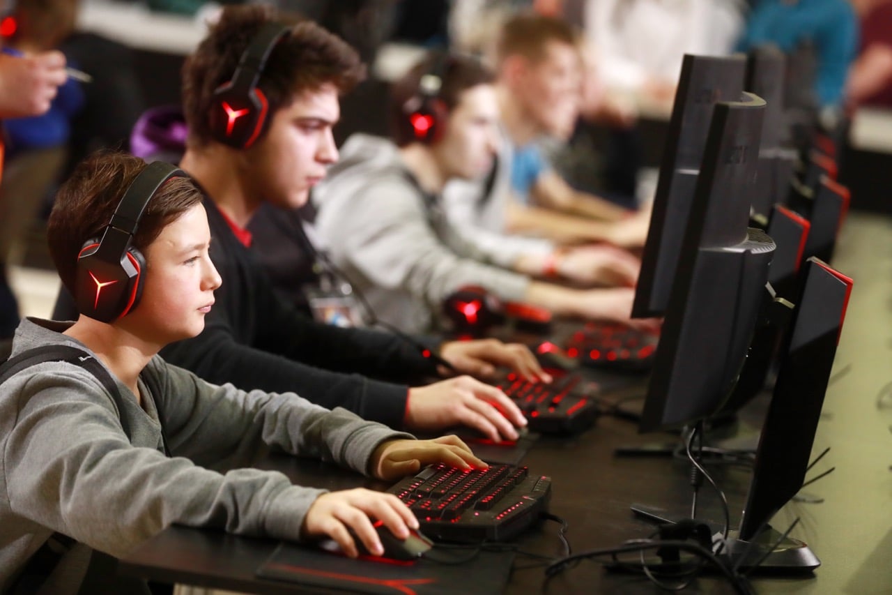Young people playing video games during a Wargaming Fest in Moscow, Russia, 23 December 2017, Sergei FadeichevTASS via Getty Images