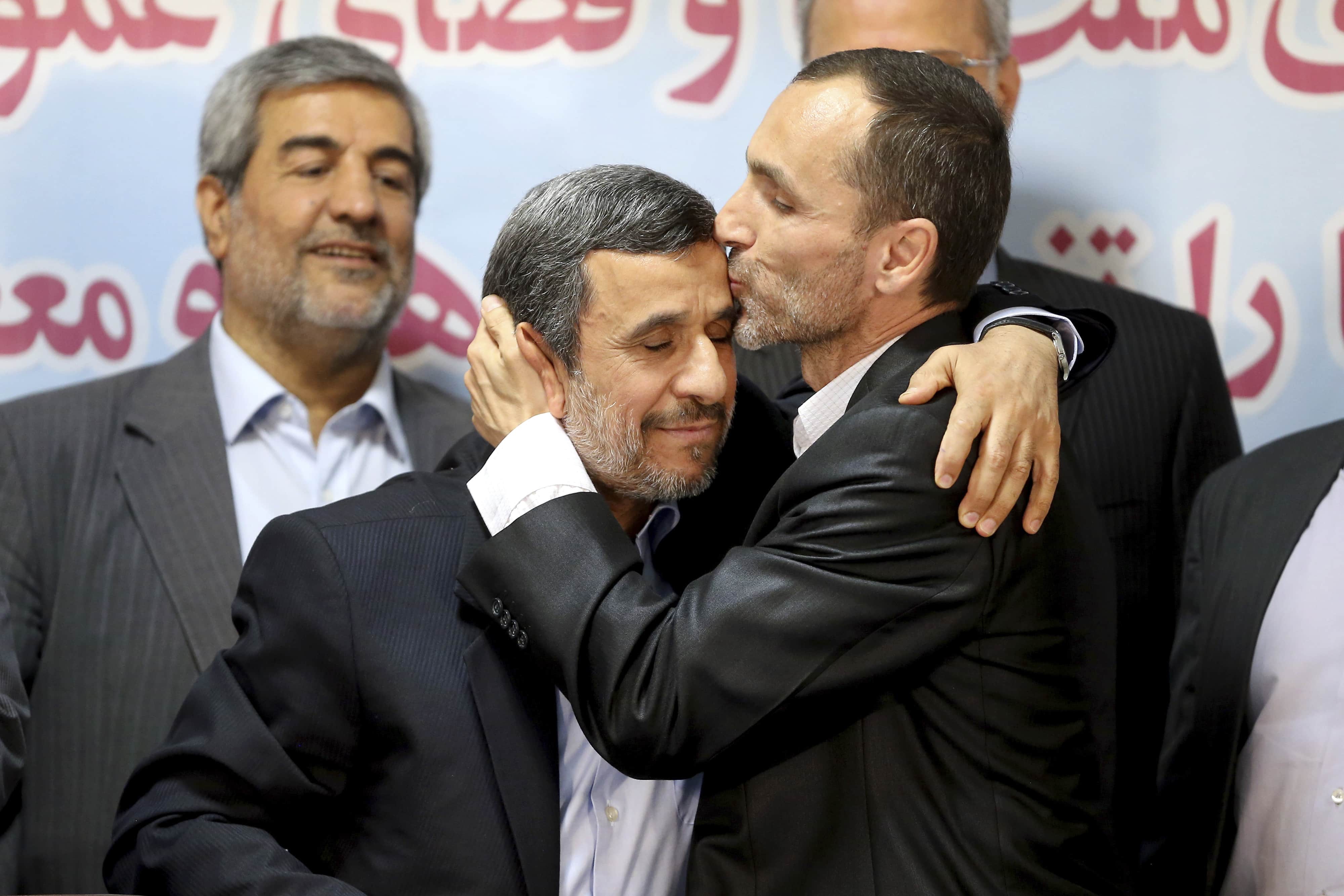 Hamid Baghaei, right, close ally of former President Mahmoud Ahmadinejad, kisses his head after registering their candidacy for the upcoming presidential elections at the Interior Ministry in Tehran, 12 April 2017, AP Photo/Ebrahim Noroozi