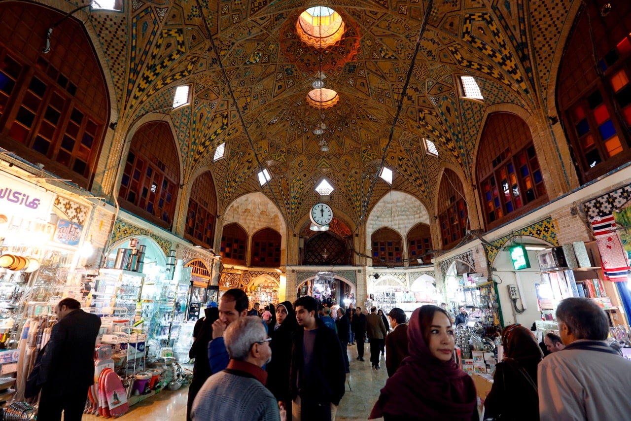 Iranians shop at Tehran's ancient Grand Bazaar, 4 January 2018; in August, 50 people were arrested during a protest in Tehran about deteriorating economic conditions and corruption, ATTA KENARE/AFP/Getty Images