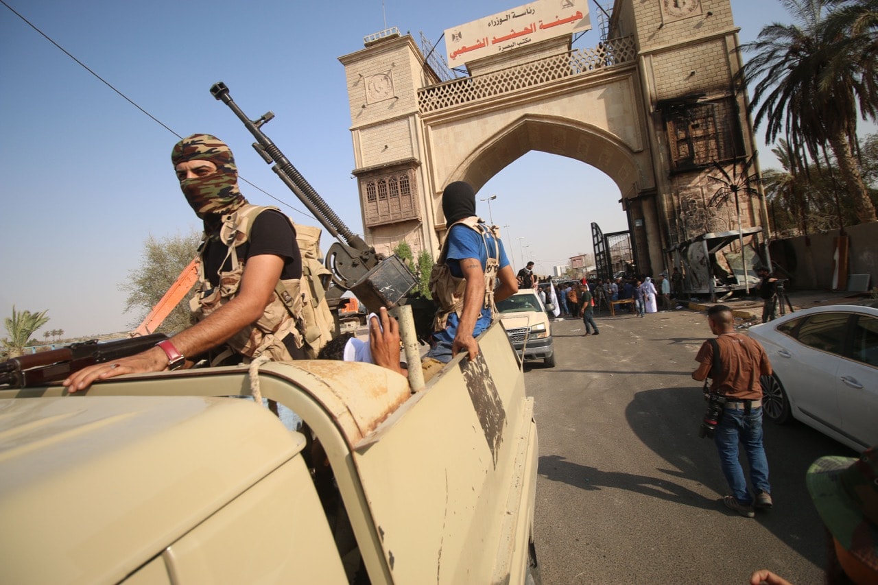 Iraqi special forces members patrol in a street in Basra on 8 September 2018, after Iraq's Joint Operations Command, which includes the army and police, vowed a 'severe' response with 'exceptional security measures', including a ban on protests and group travel, HAIDAR MOHAMMED ALI/AFP/Getty Images