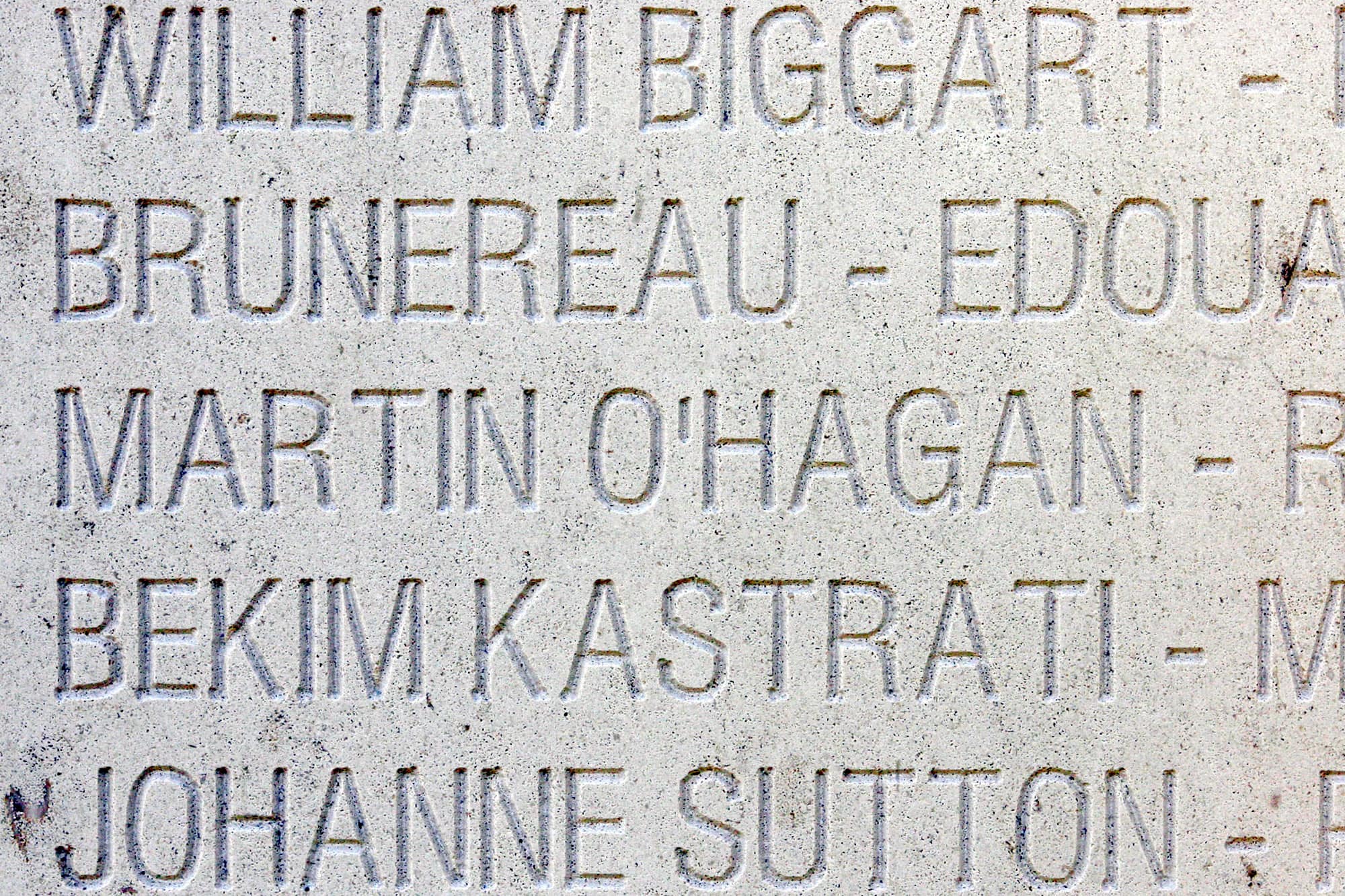 The name of Martin O'Hagan is seen engraved amongst other names on a white stone on 7 October 2006, during the inauguration of the Journalists Memorial of Bayeux, Normandy., AP Photo/Laurent Rebours