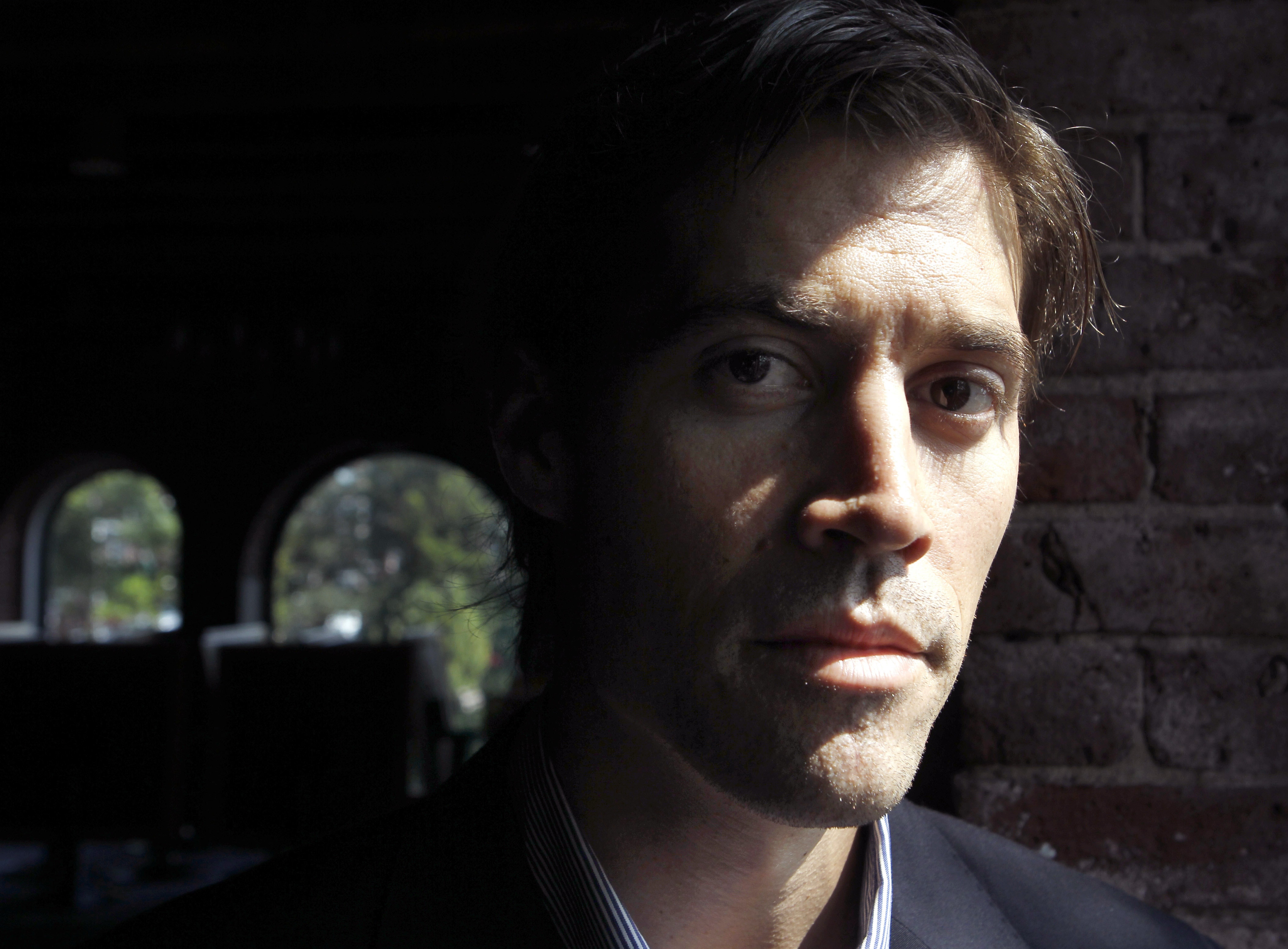 In this May 27, 2011 file photo American Journalist James Foley, of Rochester, N.H., poses for a photo in Boston, AP Photo/Steven Senne, File