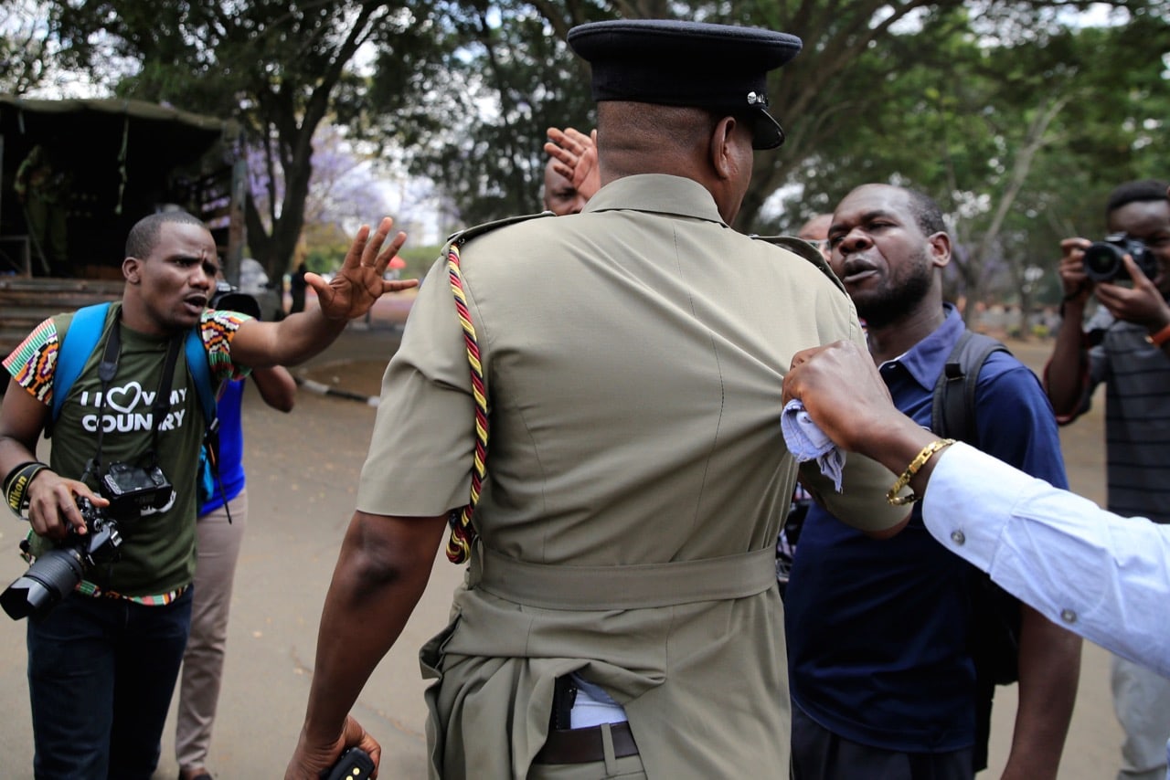 Journalists petition a senior policeman after being attacked by riot policemen as they covered anti-corruption protesters opposing the graft and abuse of funds in public healthcare, during a demonstration in Kenya's capital Nairobi, 3 November 2016, REUTERS/Thomas Mukoya