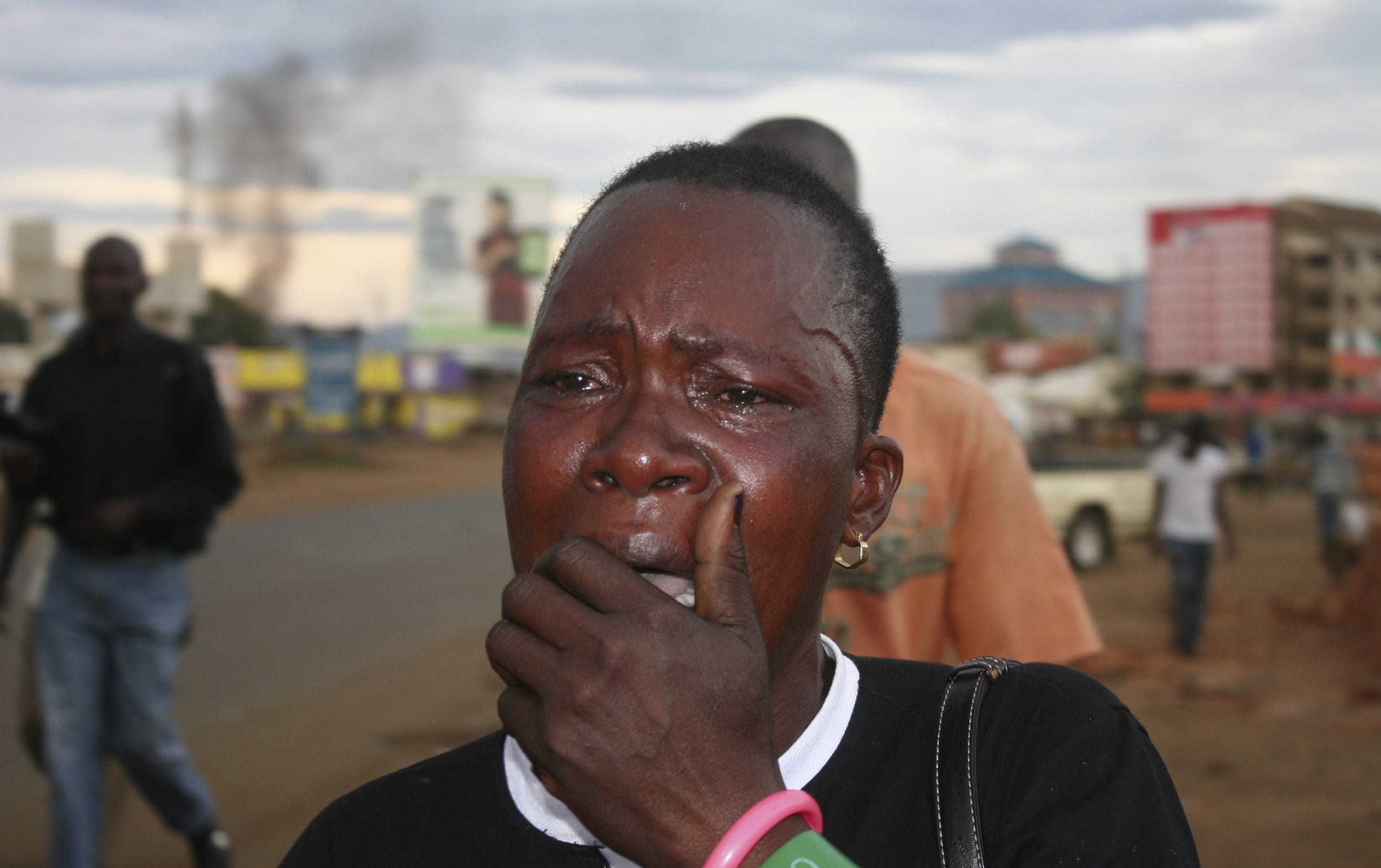 A supporter of Kenya's Prime Minister Raila Odinga, the defeated presidential candidate, reacts to the Supreme Court ruling in Kisumu, 30 March 30 2013., REUTERS/Moses Eshiwani