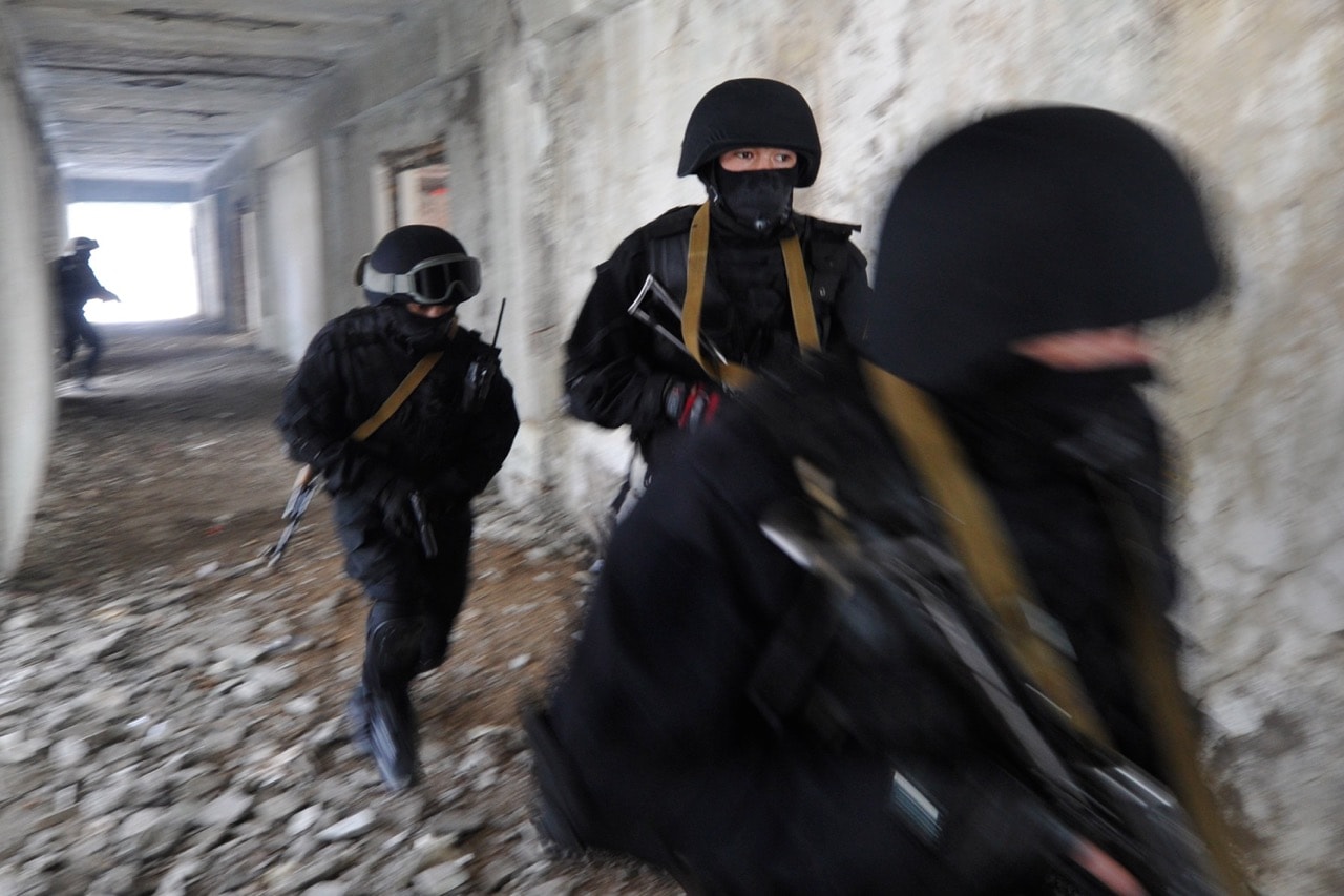 Kyrgyz Interior Ministry officers and servicemen take part in an anti-terrorist exercise near a penal colony in the village of Moldovanovka, some 40 km from the capital Bishkek, 29 February 2012, VYACHESLAV OSELEDKO/AFP/Getty Images