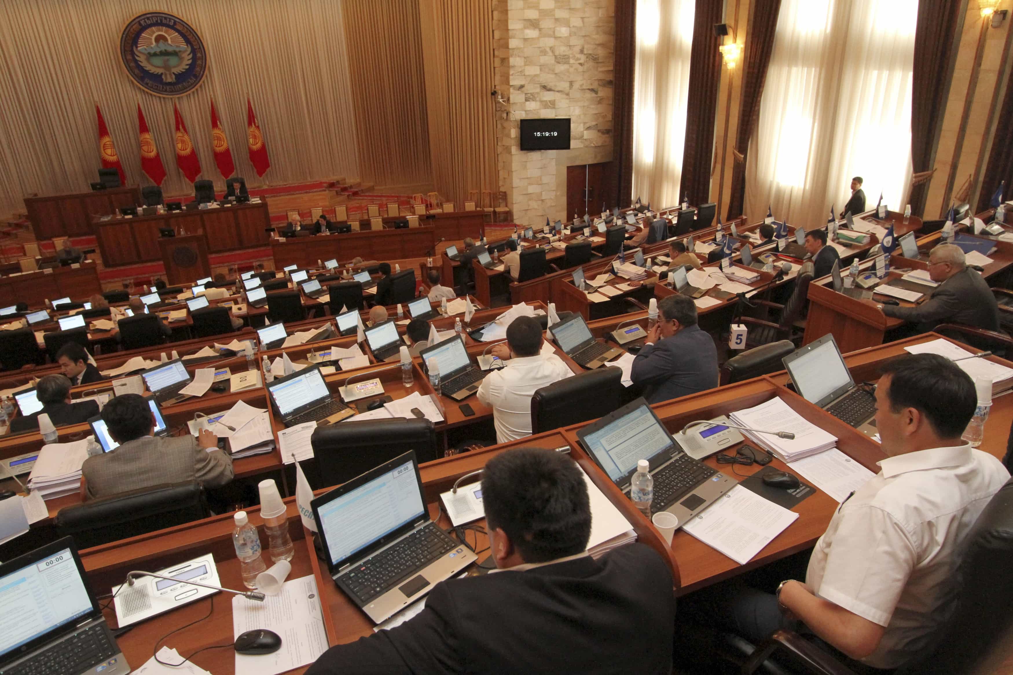 Parliament members attend a session in Bishkek, 20 June 2013. , REUTERS/Vladimir Pirogov