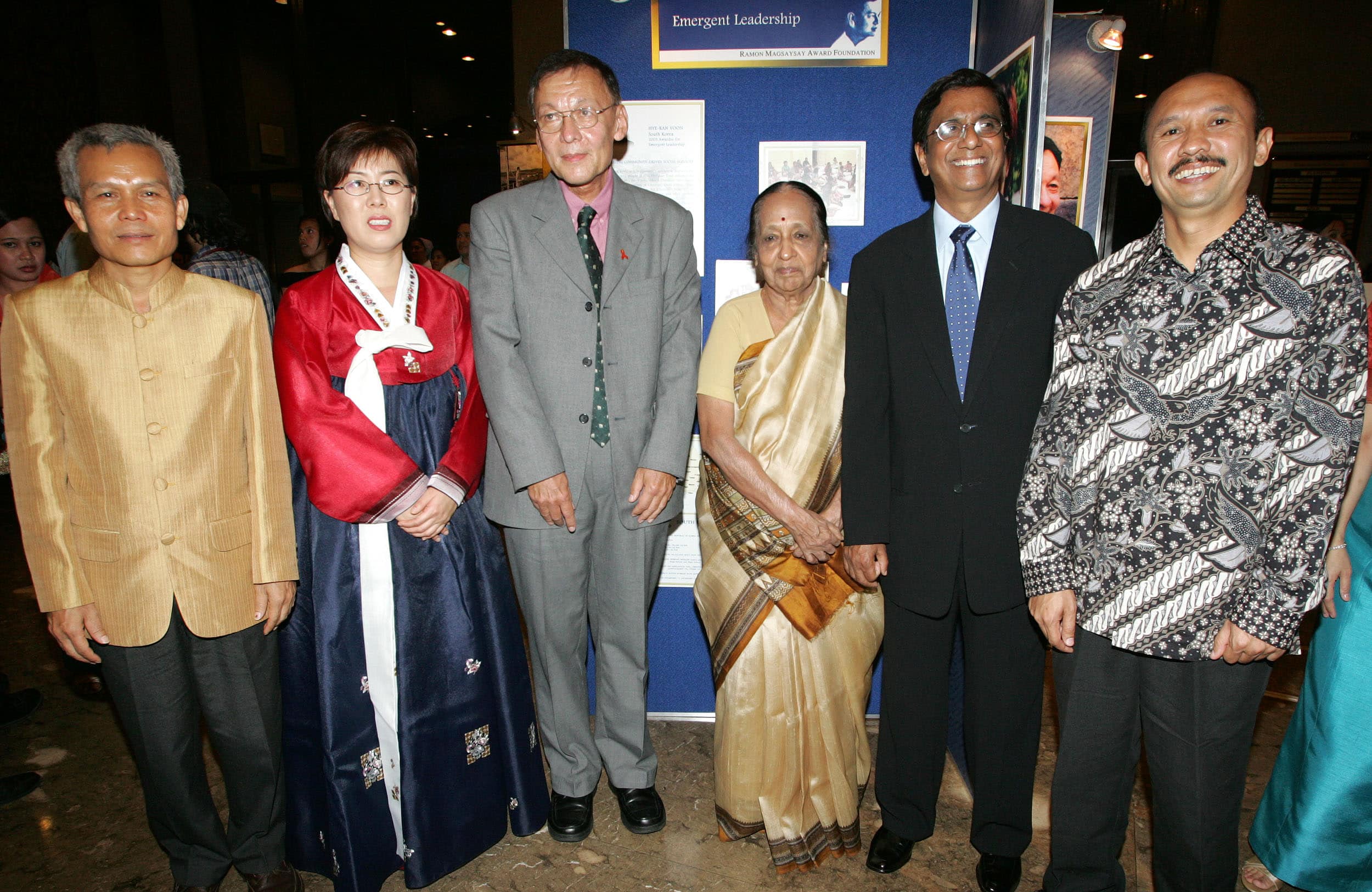 Sombath Somphone (on the left, wearing a gold-hued jacket) appears with other winners of the Ramon Magsaysay Awards during a ceremony in Manila, Philippines, 31 August 2005, REUTERS/Romeo Ranoco RR/DY