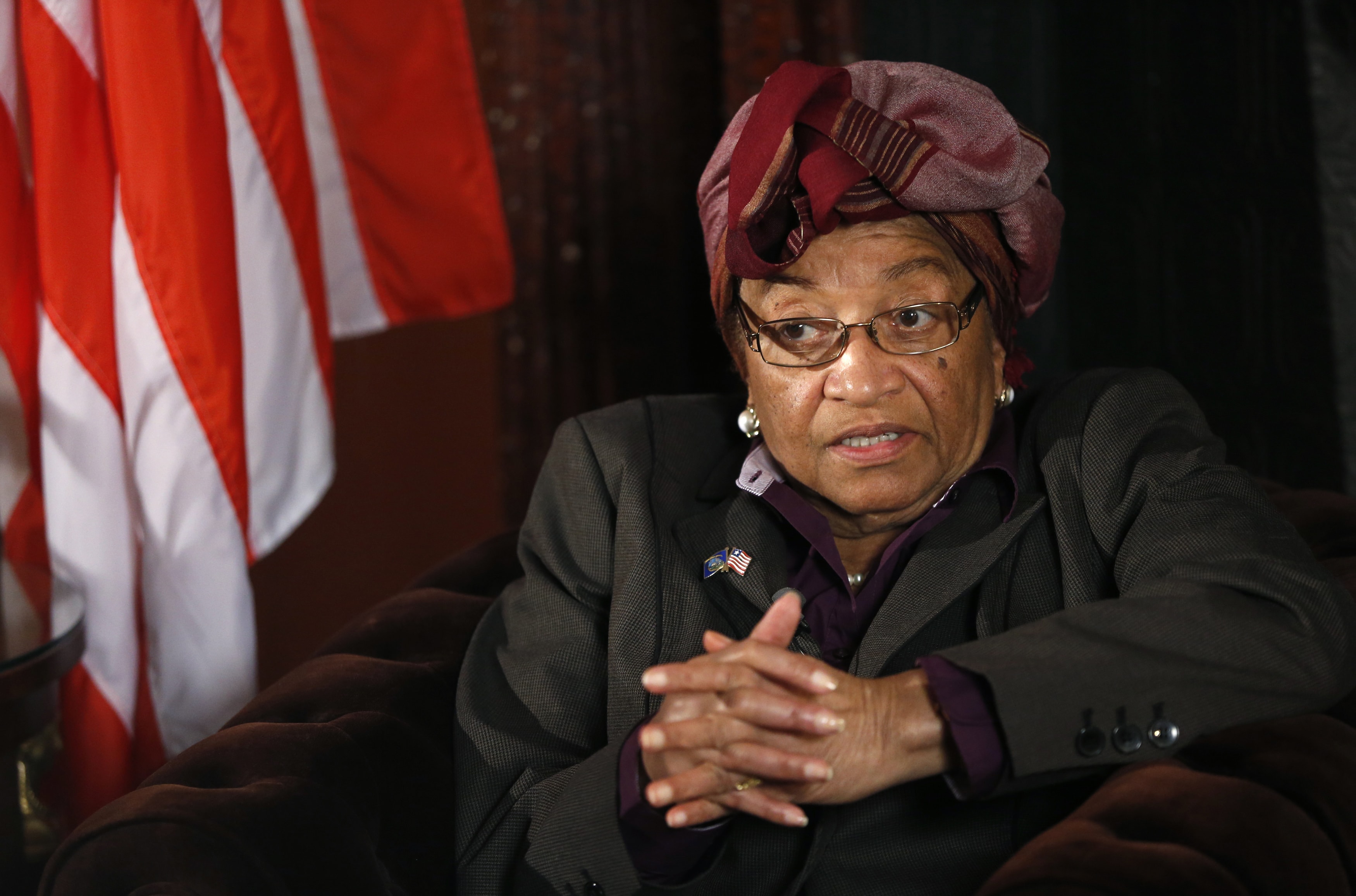 Liberian President Ellen Johnson-Sirleaf speaks during an interview with Reuters in Brussels, 25 November 2013, REUTERS/Francois Lenoir