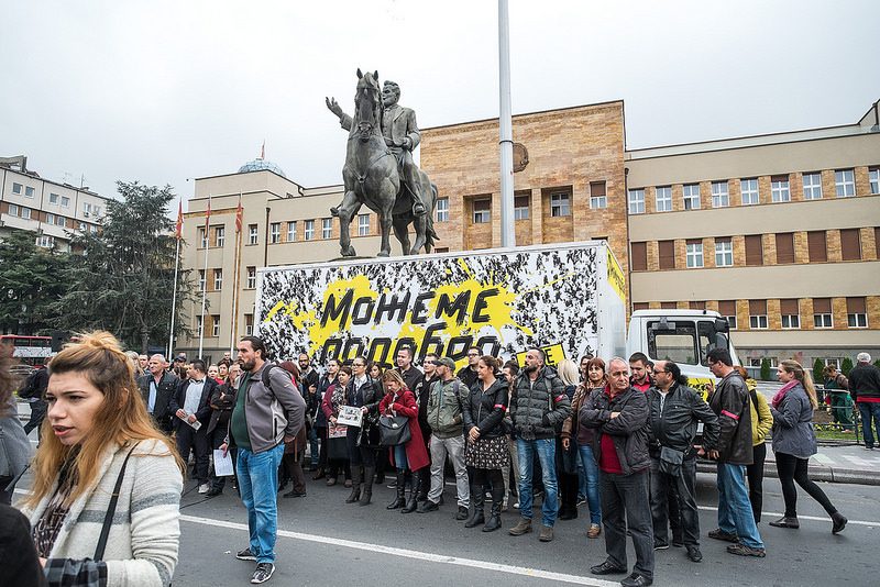 Protesters gather in front of the parliament as part of the "We Decide" campaign in October 2016. The sign on the truck says "We can do better", Vančo Džambaski via Flickr (CC BY-NC-SA 2.0)