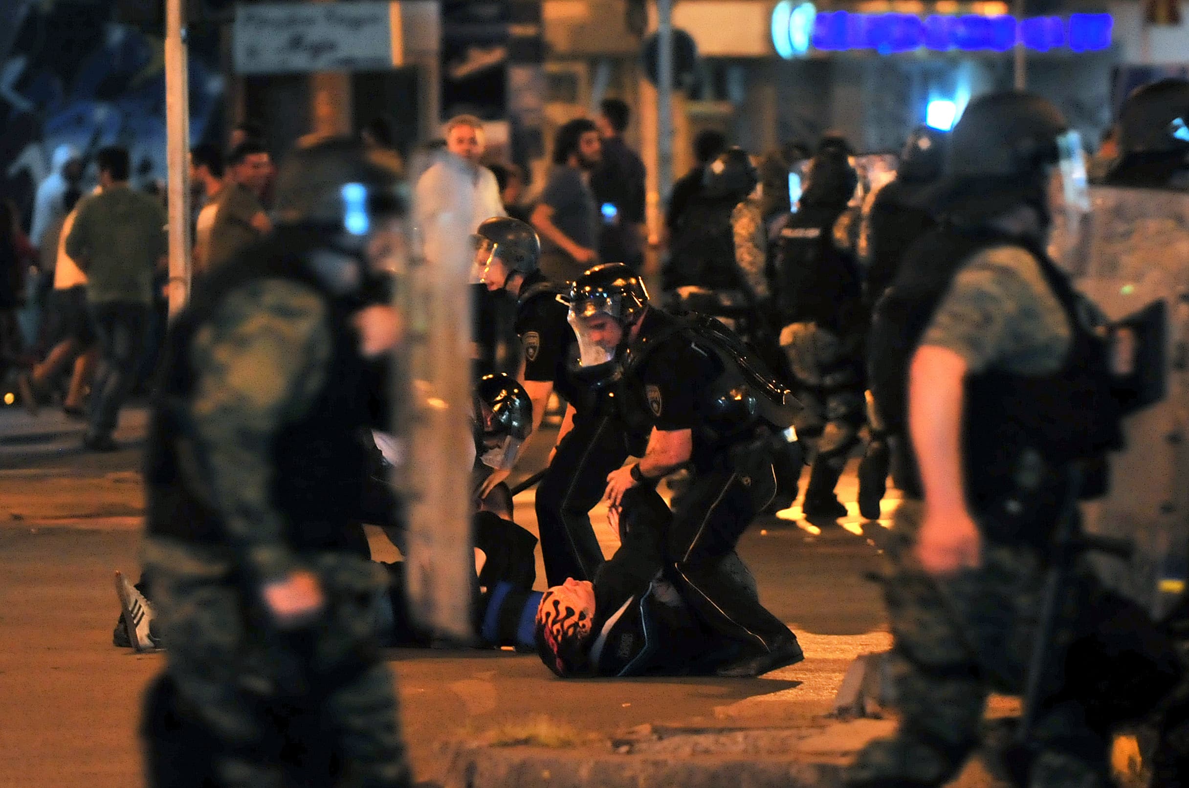Police arrest protesters after clashes during a protest in Skopje, 5 May 2015, AP Photo/Vangel Tanurovski