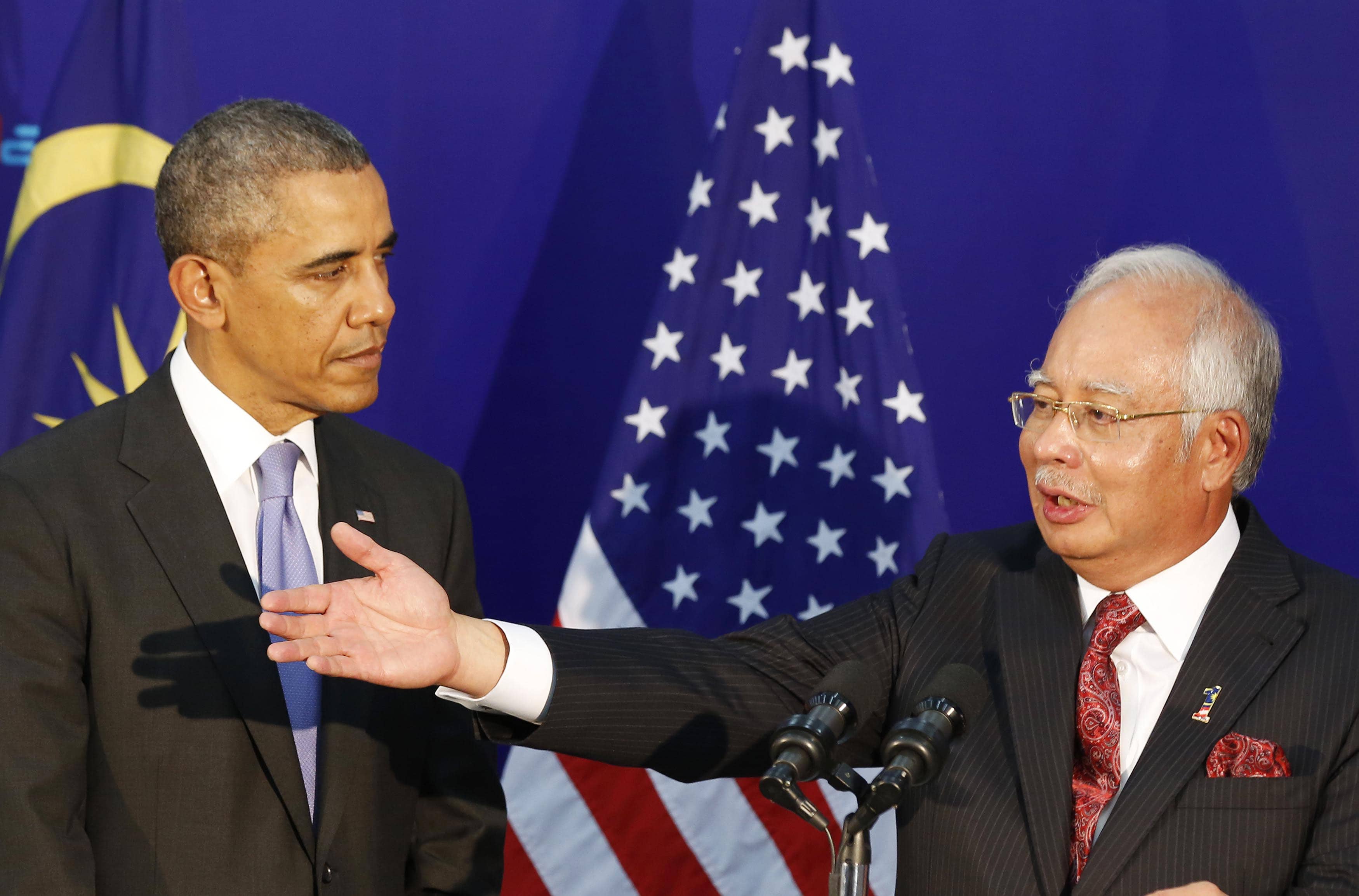 U.S. President Barack Obama (L) and Malaysia's Prime Minister Najib Razak speak at the Malaysian Global Innovation and Creativity Center in Cyberjaya, 27 April 2014, REUTERS/Larry Downing