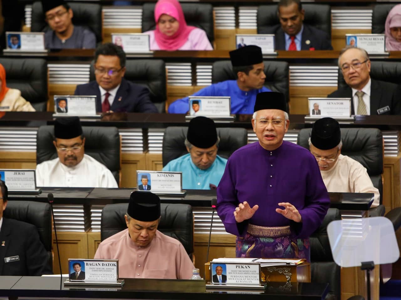 In this 23 October 2015 photo, Malaysian Prime Minister Najib Razak, front row right, speaks at Parliament House in Kuala Lumpur, AP Photo/Joshua Paul
