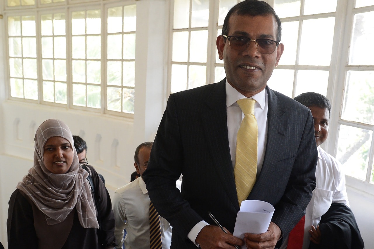 Former President of the Maldives and exiled opposition leader Mohamed Nasheed (C) arrives for a press conference in Colombo, Sri Lanka, on 22 January 2018, LAKRUWAN WANNIARACHCHI/AFP/Getty Images