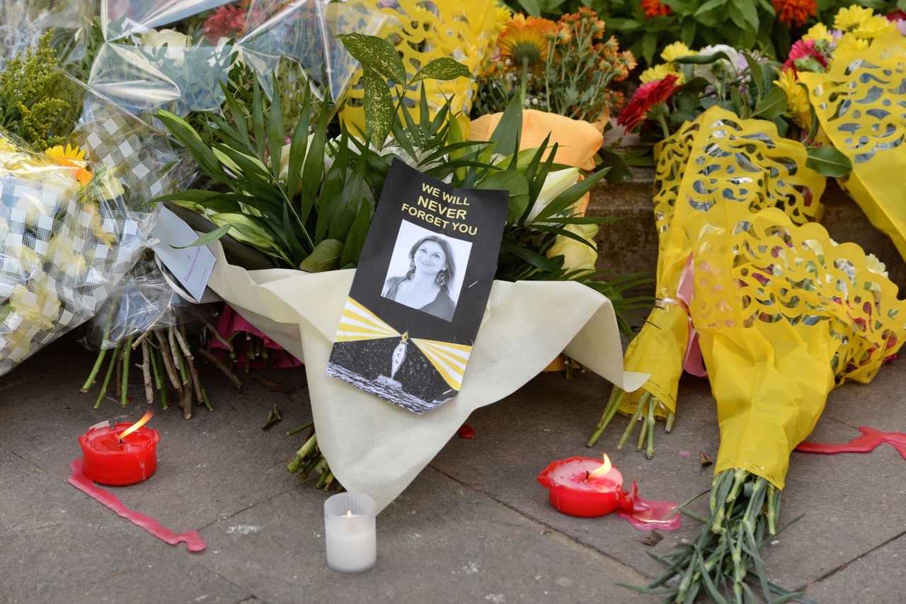 Valletta, Malta, 19 October 2017. Flowers and tributes at the foot of the Great Siege monument which was turned into a temporary shrine for Daphne Caruana Galizia after her assassination, MATTHEW MIRABELLI/AFP/Getty Images
