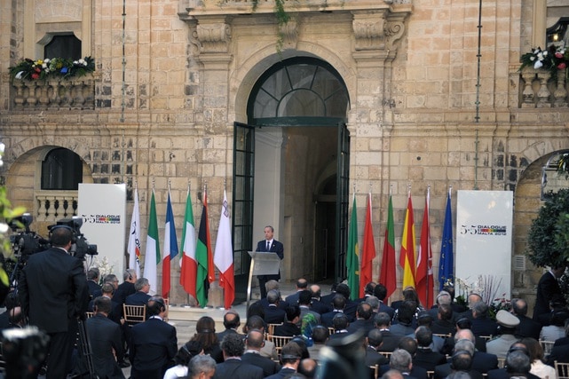 Then Prime Minister Lawrence Gonzi delivers the opening address of a summit in the courtyard of the Auberge de Castille in Valletta, Malta, 5 October 2012, Matthew Mirabelli/AFP/GettyImages