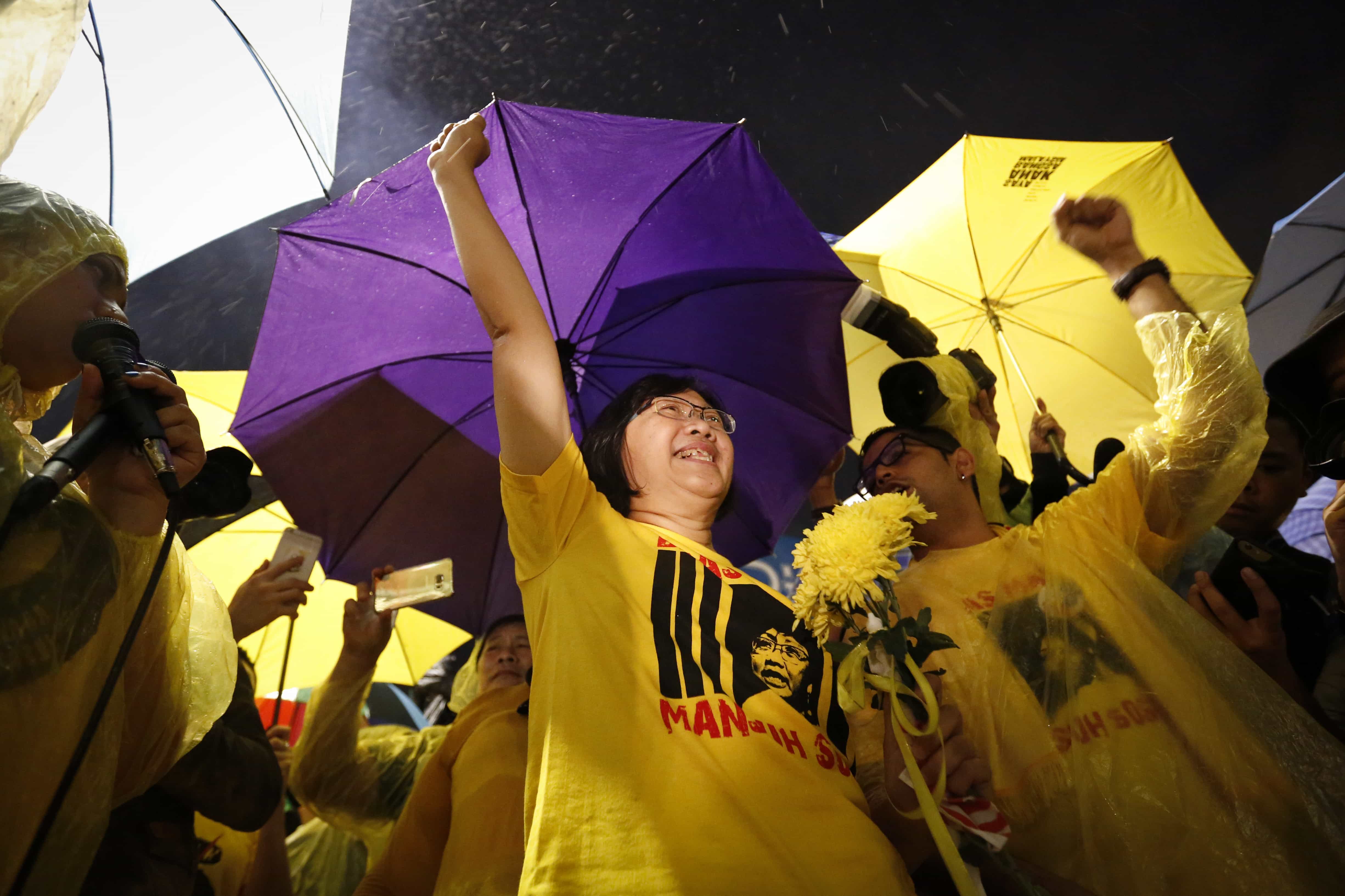 Bersih Chairwoman Maria Chin Abdullah waves to the crowd during a candlelight vigil at Merdeka Square, Kuala Lumpur, on 28 November 2016., AP/Lim Huey Teng